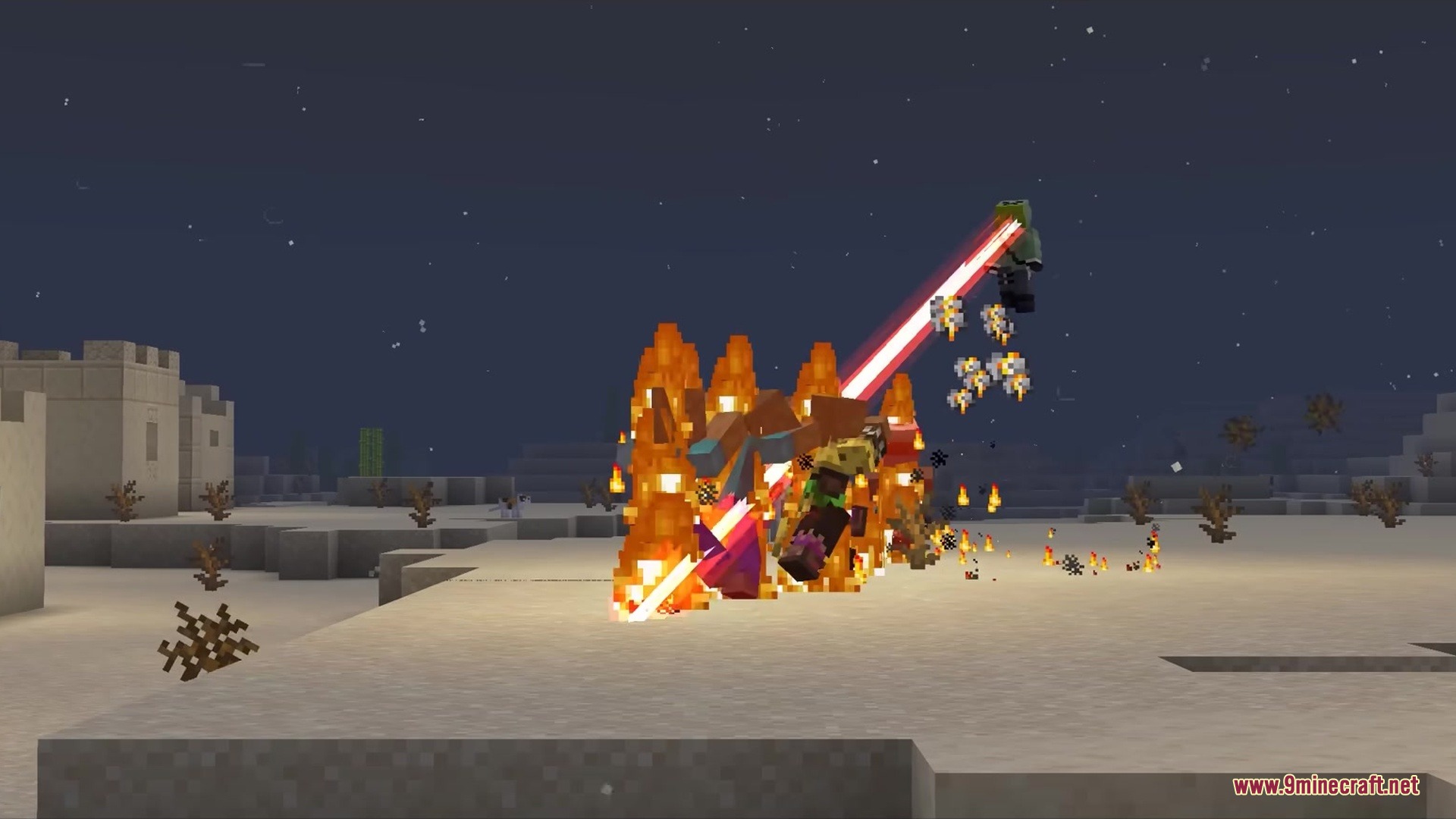 Slag N' Embers Mod Screenshot 1 A mob fires a red laser beam at burning enemies in the desert