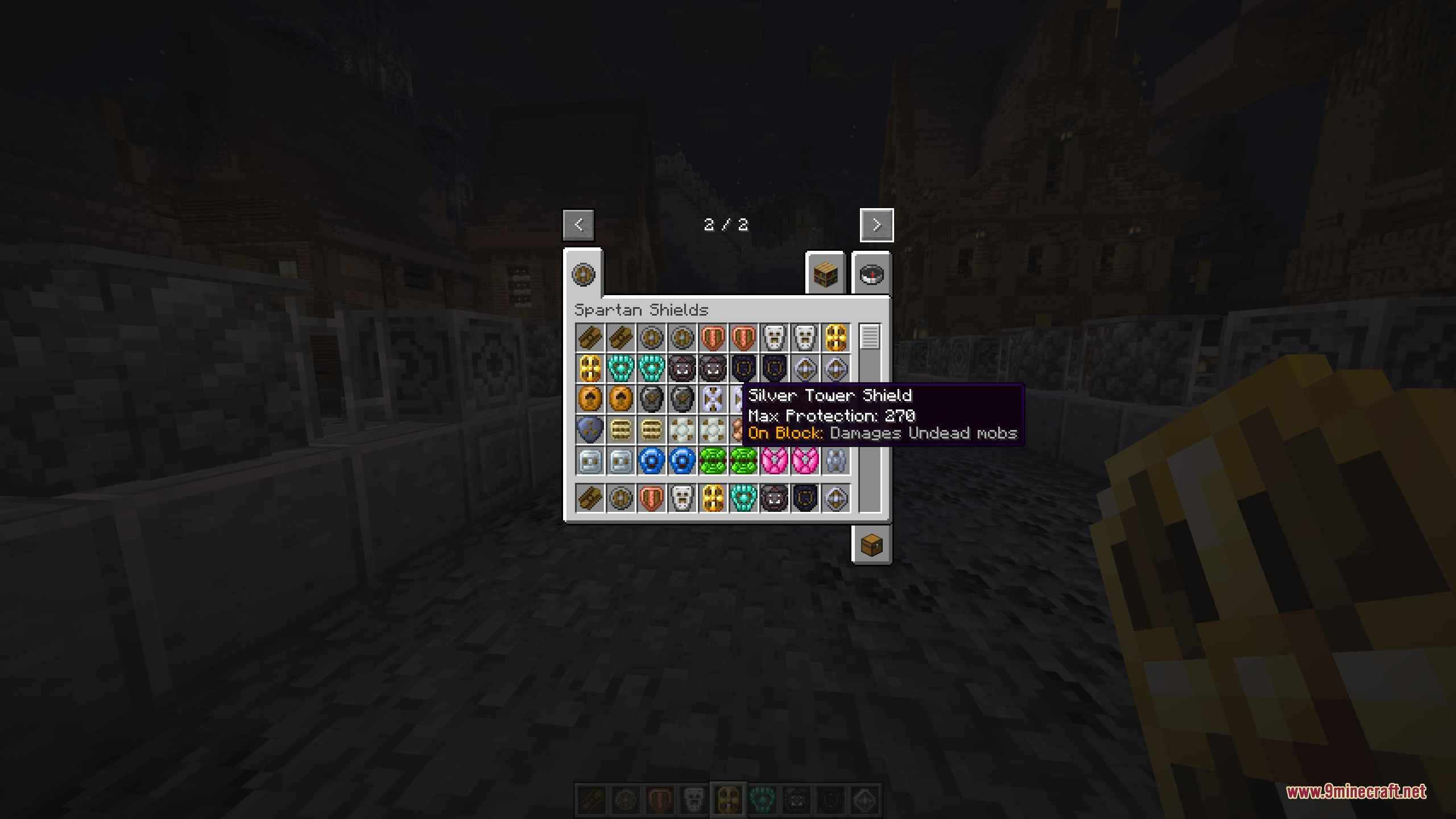 The Spartan Shields creative tab open on its second page, with a tooltip for the Silver Tower Shield showing a Max Protection of 270 and an On Block effect that damages undead mobs