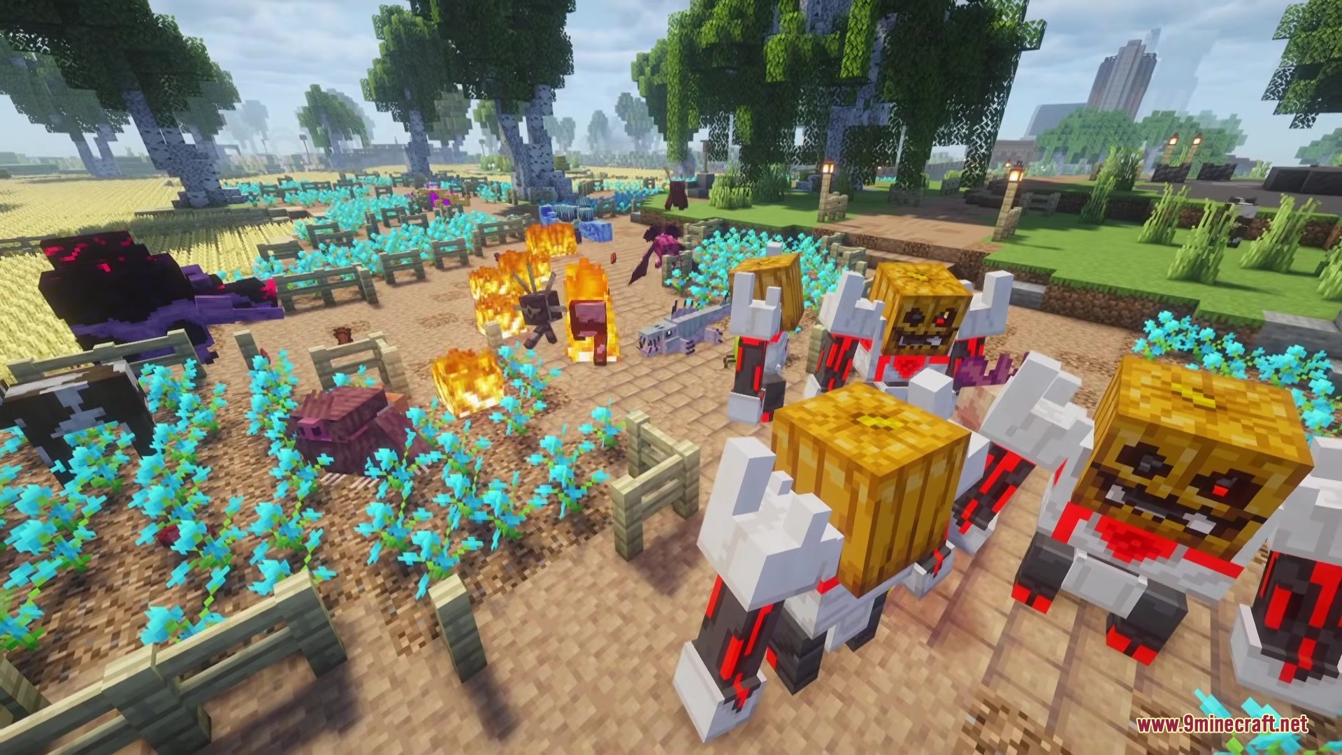 Spidertron Mod Screenshot 1 Mechanical mobs with pumpkin heads standing near fire in a field of blue flowers