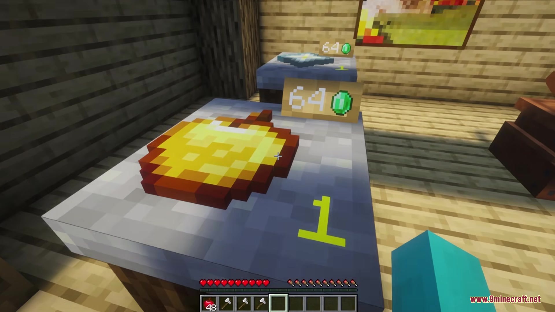 Spud's Shops Mod Screenshot 3 A golden apple on a windowsill display with an emerald price tag