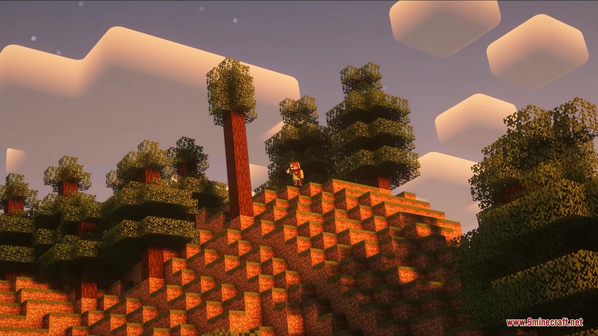 Stained Lenses Mod Screenshot 1 A player stands on a hill using a spyglass at sunset