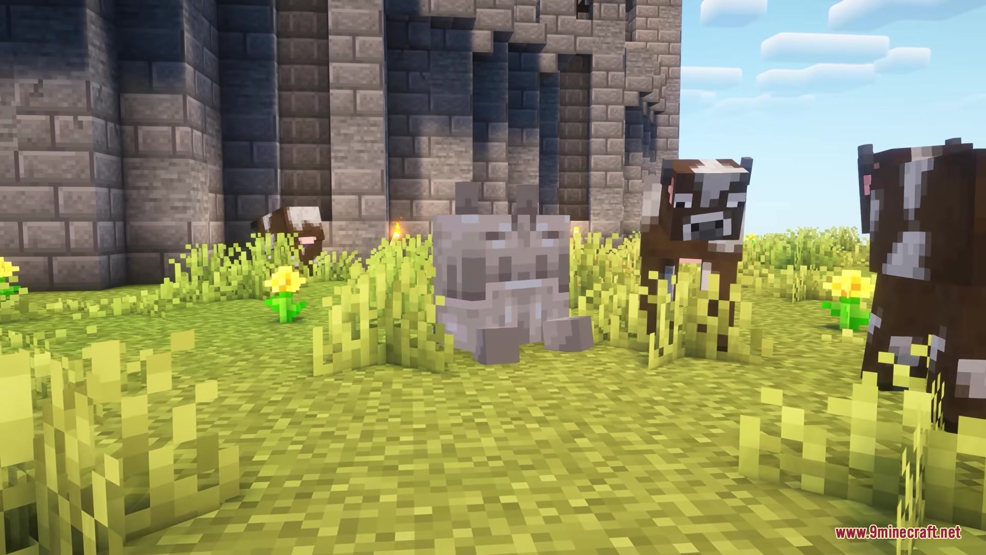 Stoneveil Mod Screenshot 6 A small stone Grumblo creature sits in the grass near some cows