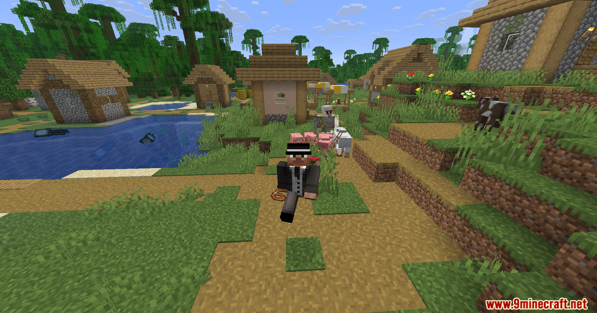 Strong Leads Mod Screenshot 5 Minecraft player wearing a suit leads several animals through a village path