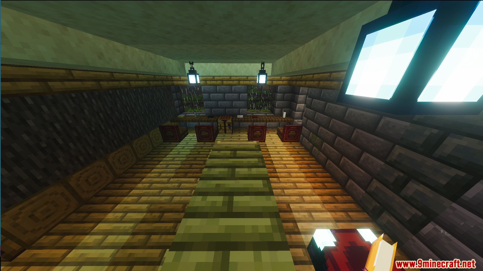 Cozy room with a long wooden table and hanging lanterns inside