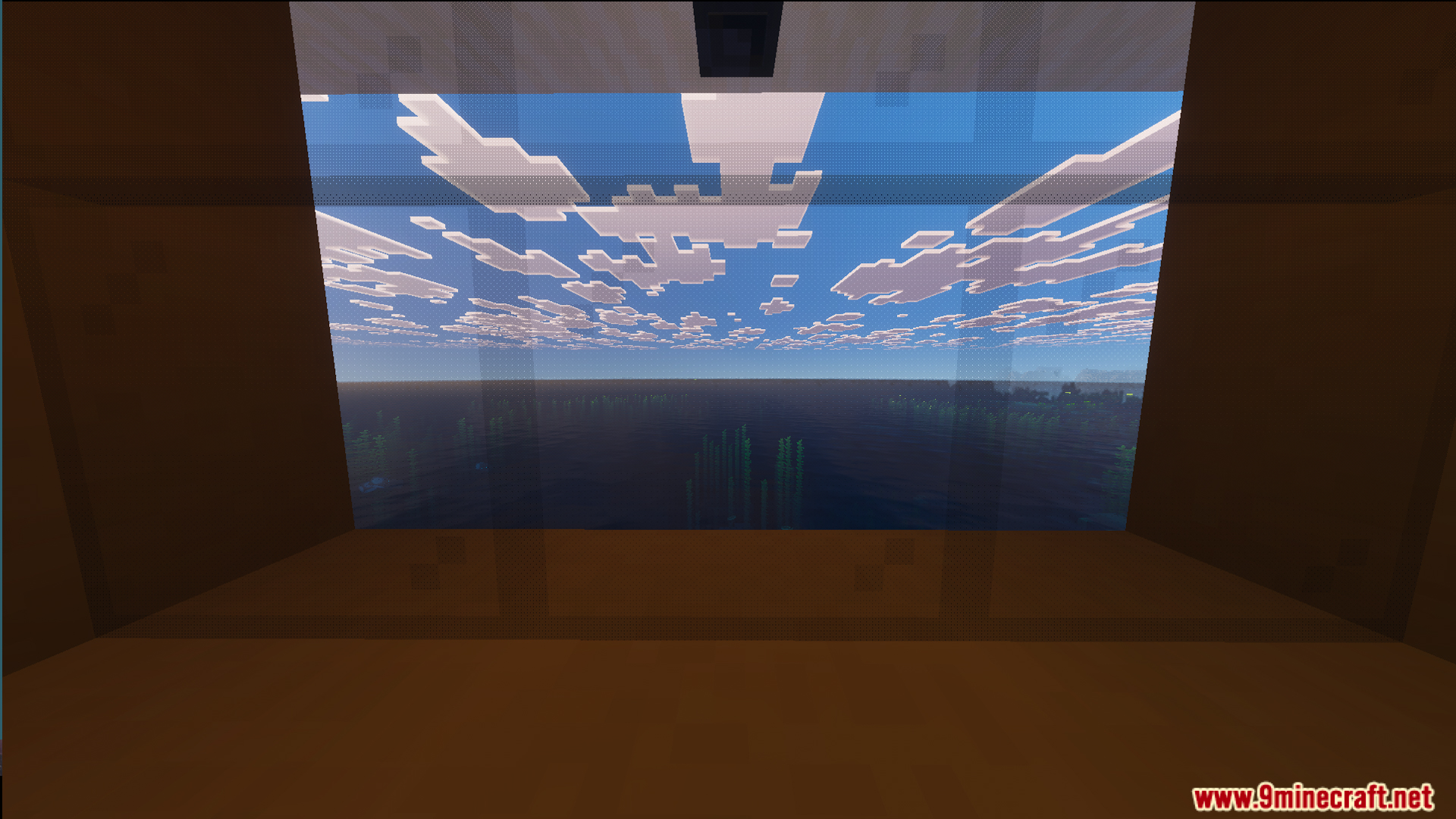 Scenic view of the plains biome landscape through a large glass window