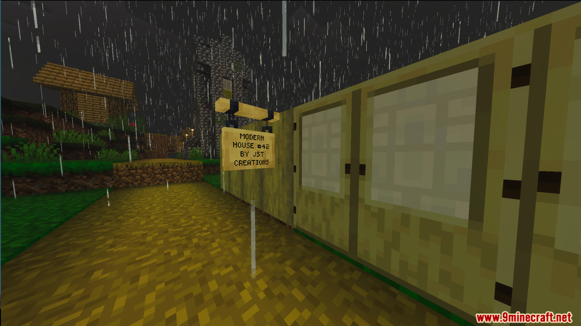Survival Modern House 42 Map Screenshot 2 Wooden sign for Survival Modern House 42 Map next to a village