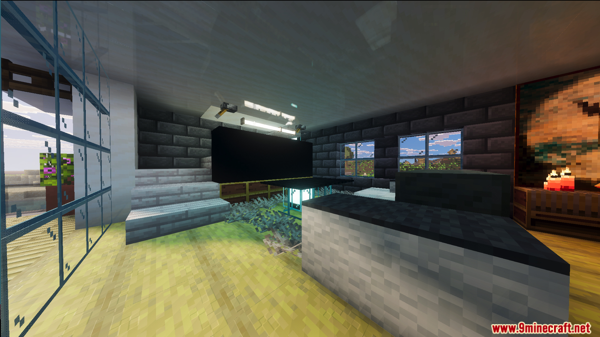 Decorated room inside a modern house with stone brick walls and black screen