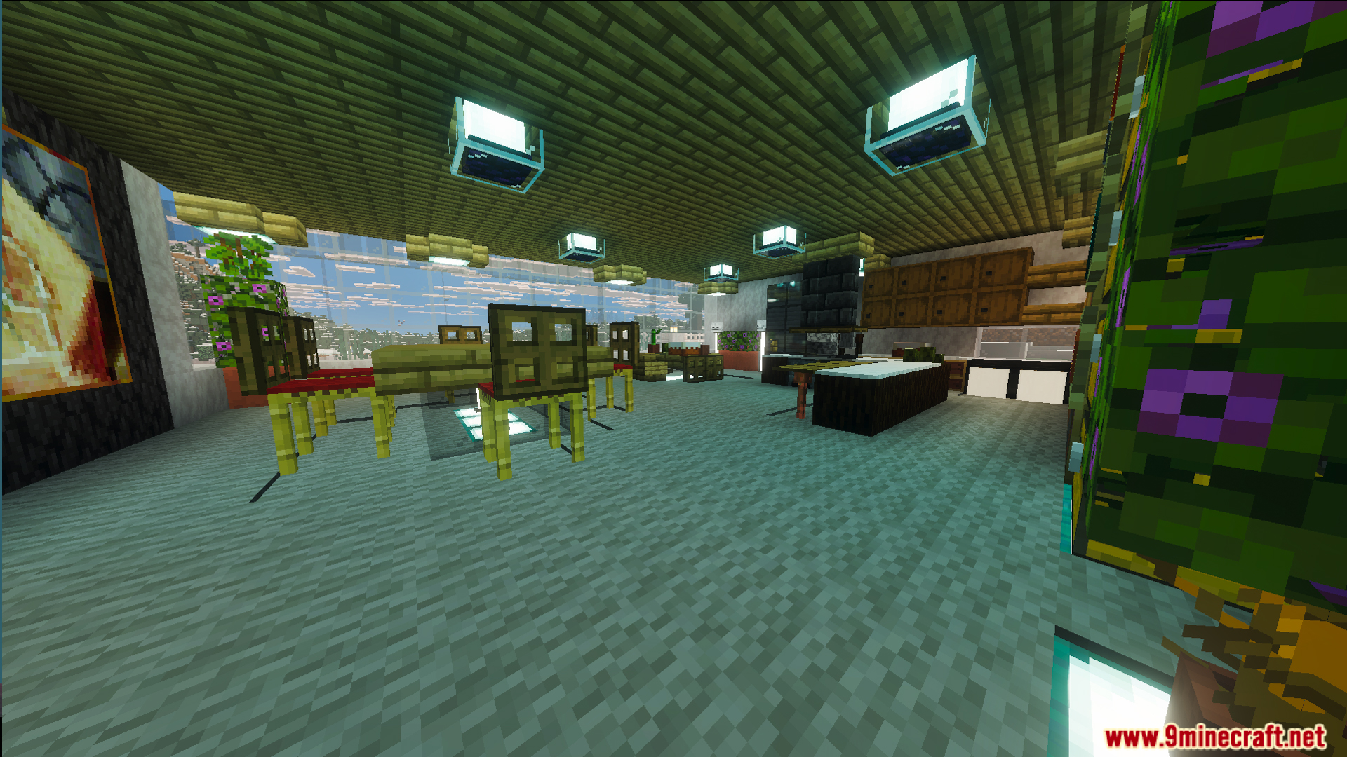 A decorated kitchen with wooden furniture and large windows overlooking a snowy biome