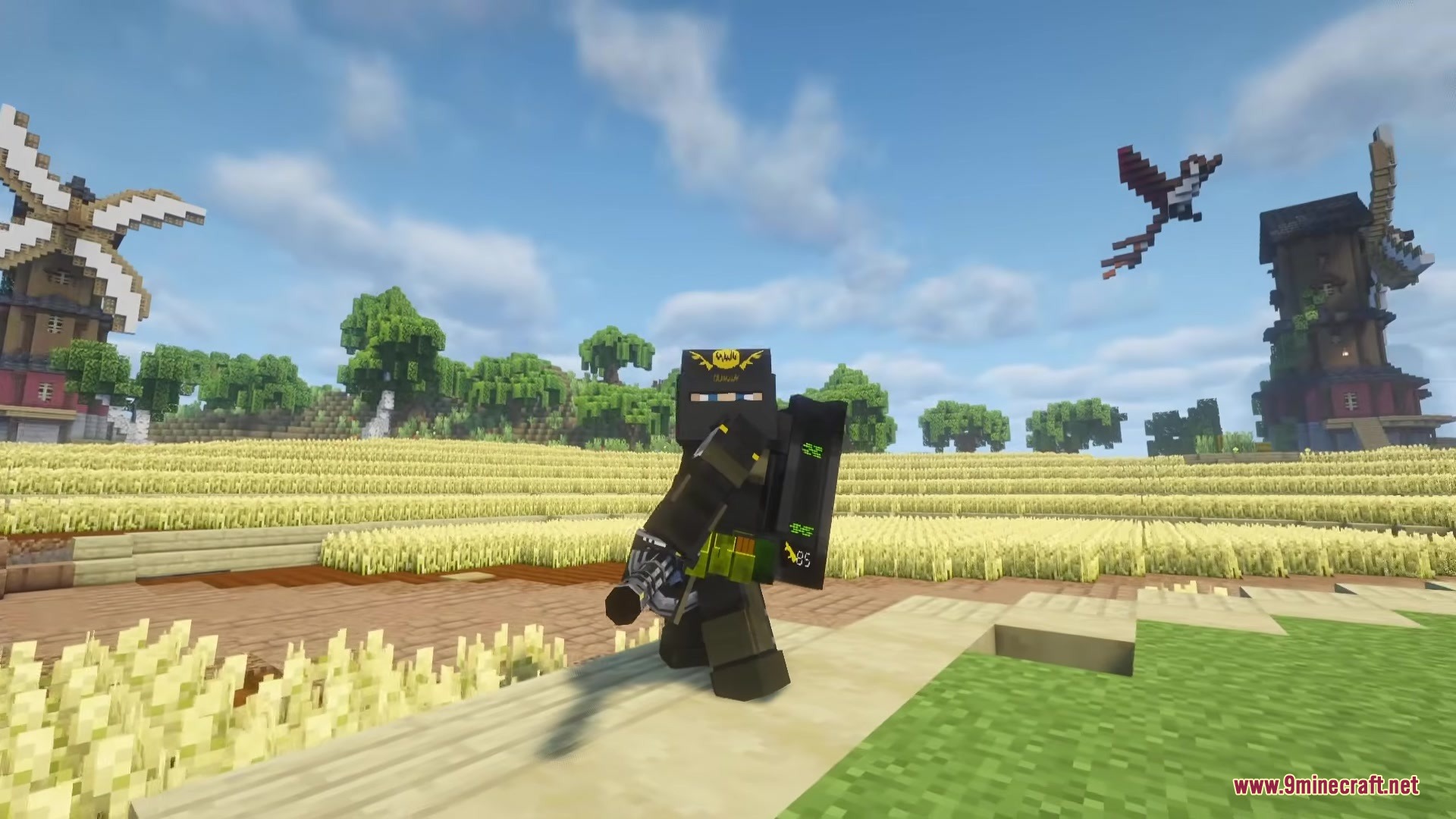 TACZ Juggernaut Armoury Mod Screenshot 3 Player wearing Juggernaut Armoury tactical gear holding a gun in a wheat field
