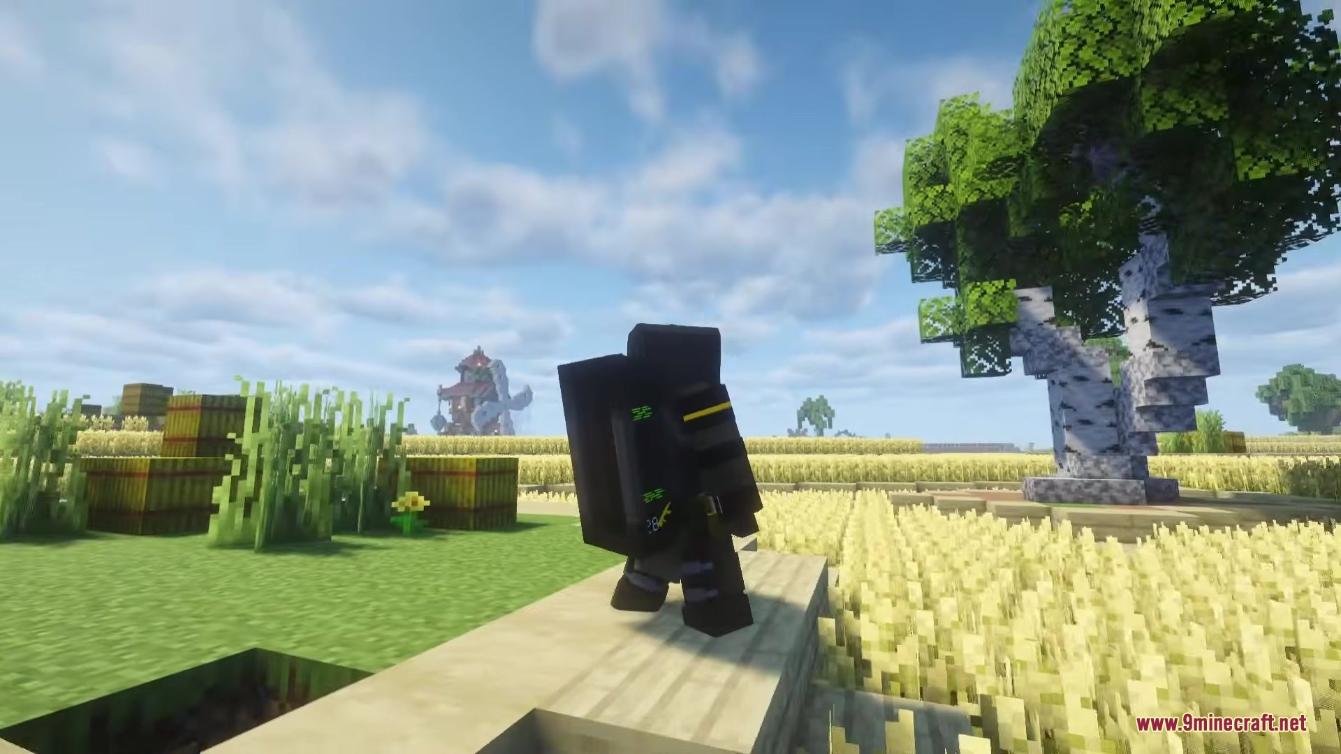 TACZ Juggernaut Armoury Mod Screenshot 4 Character in heavy black tactical armor standing near a birch tree