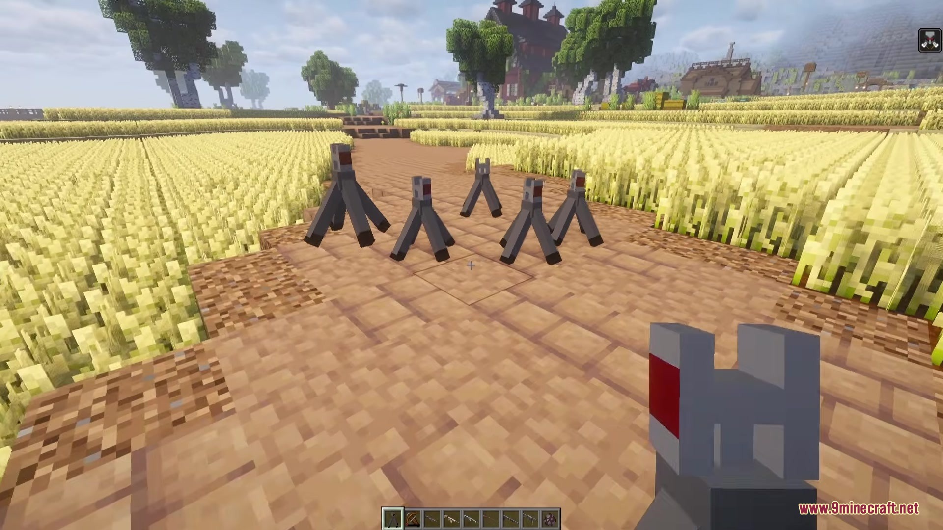 TACZ Turrets Mod Screenshot 2 Several empty turret stands placed along a path in a farm