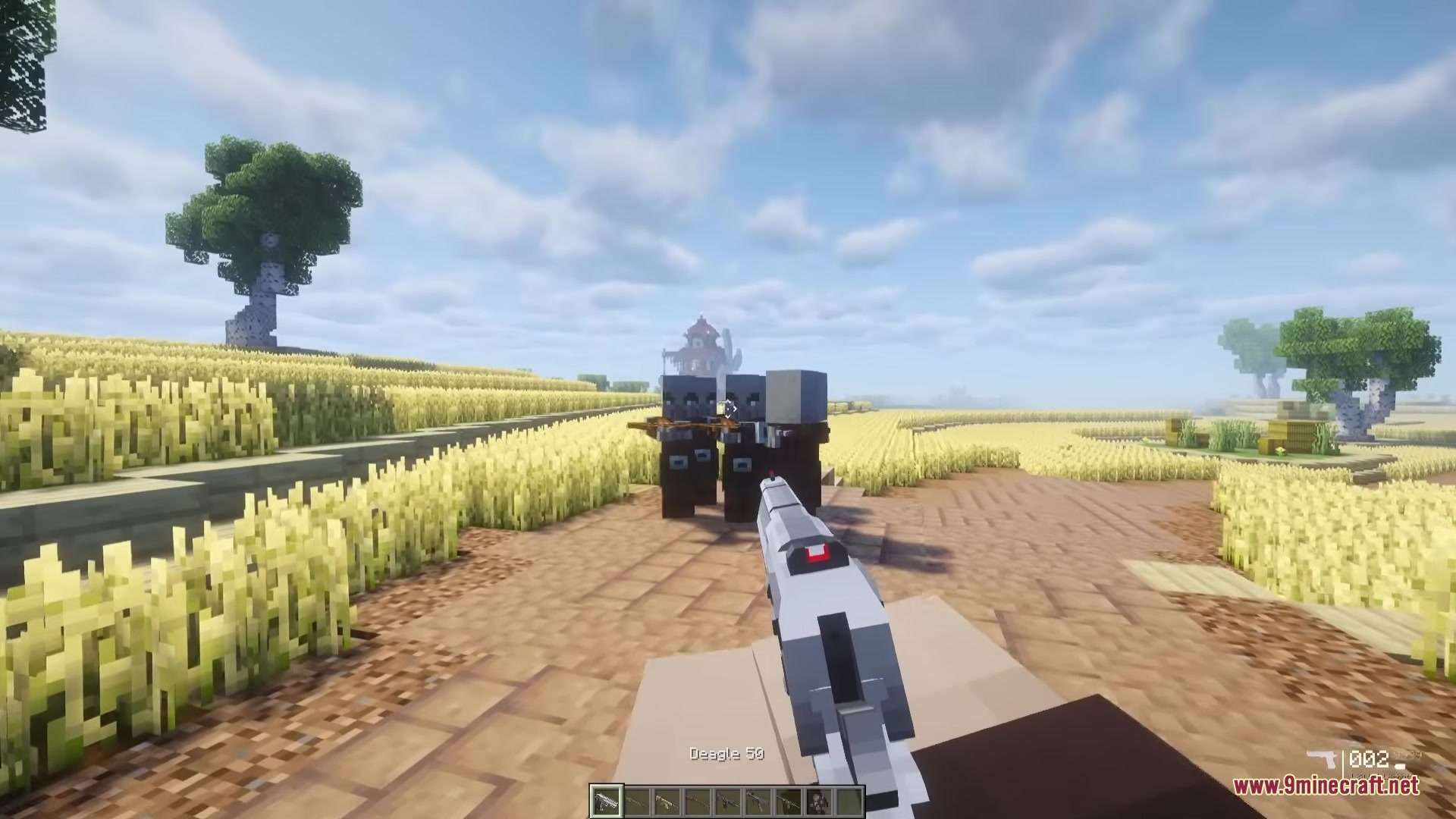 TaCZ Attributes Mod Screenshot 4 A player targets a group of Pillagers with a Deagle pistol