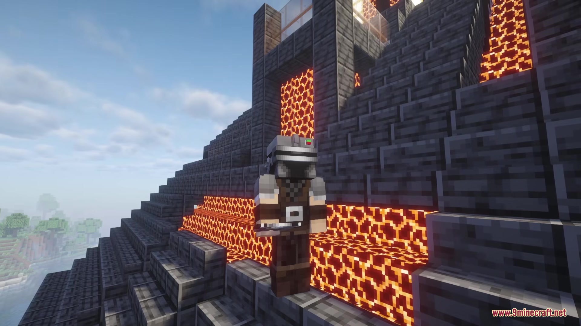 A player wearing futuristic armor stands on a staircase made of magma blocks
