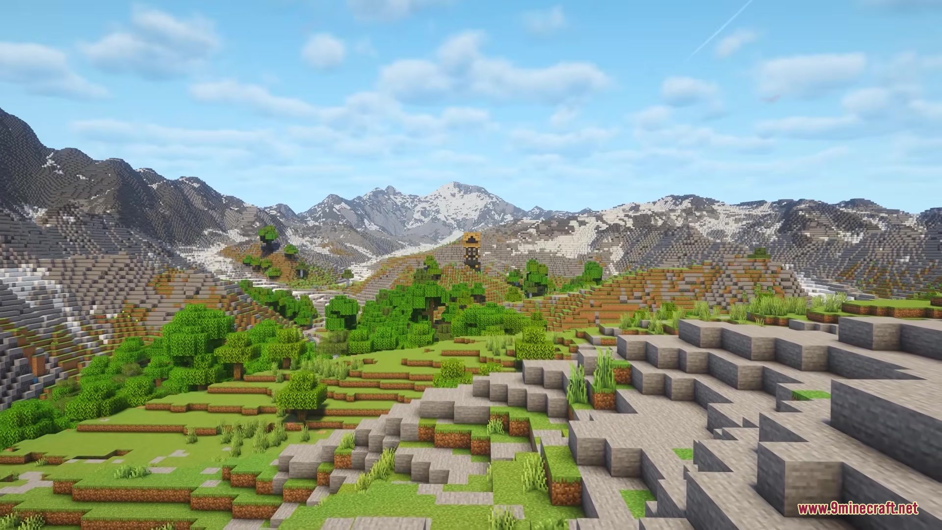 Tellus Mod generates a vast mountain range with green valleys and trees