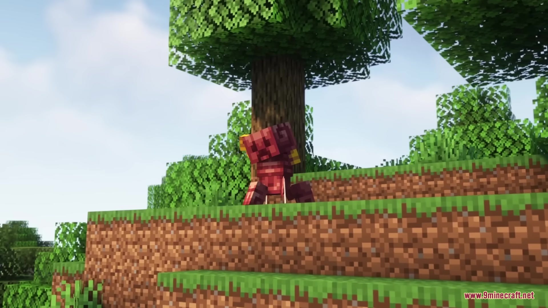 A red flying Crimera creature hovers near a tree on a grassy hill