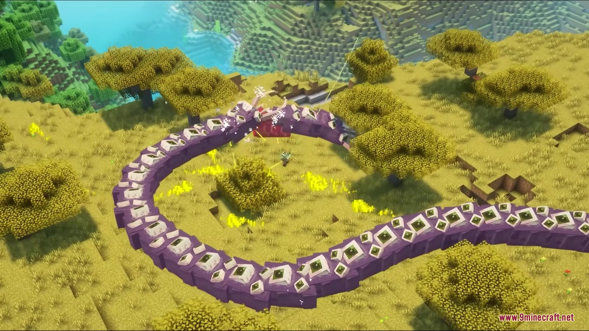 A massive purple Eater of Worlds boss circles a player in the savanna