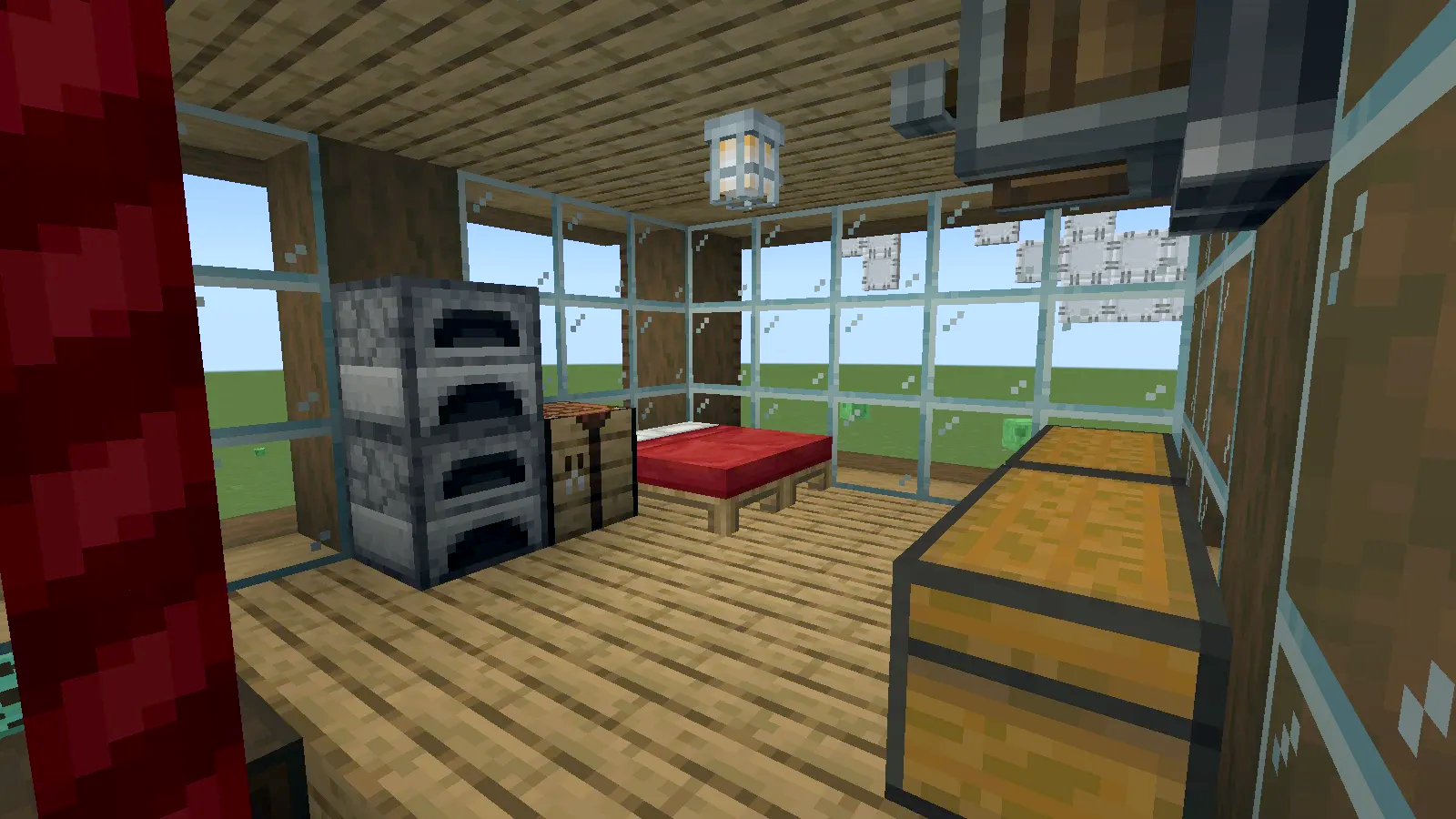 Interior cabin of a Minecraft airship with bed and storage blocks