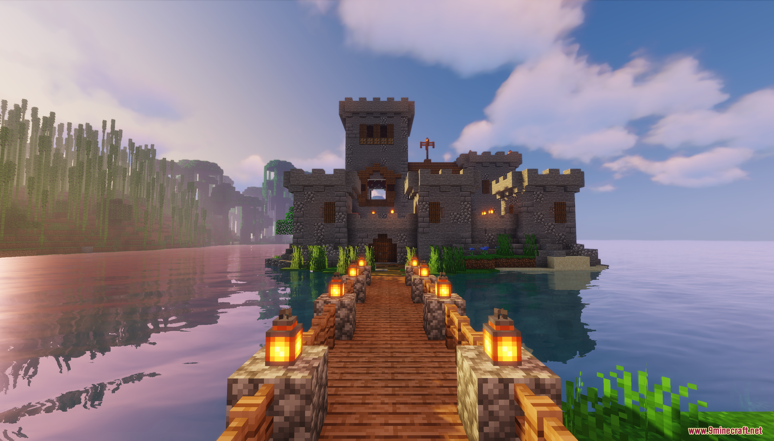 The Island Castle Map Screenshot 1 A wooden bridge with glowing lanterns leading to a medieval stone island castle