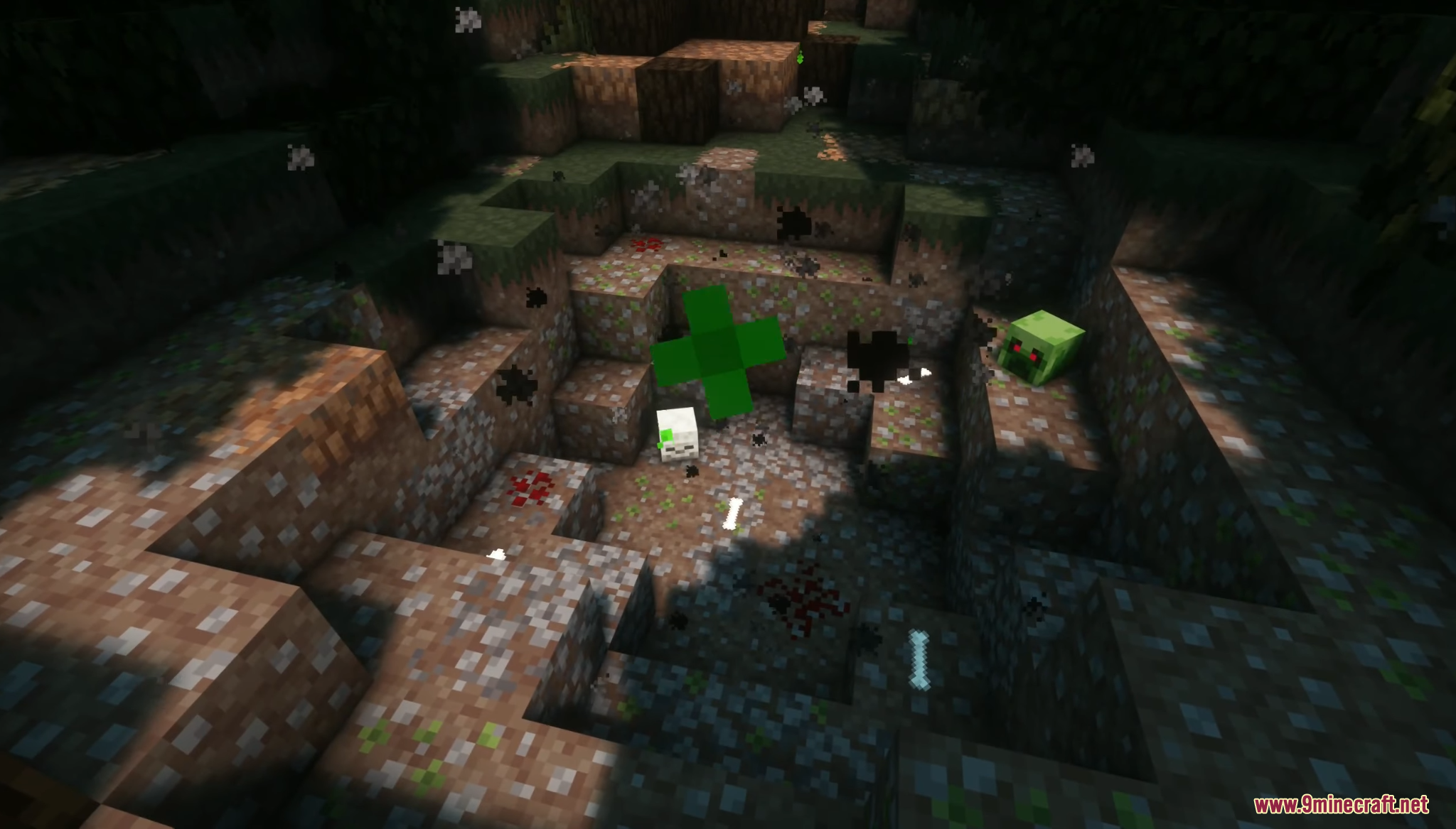 A mysterious pit containing a green cross and scattered mob heads