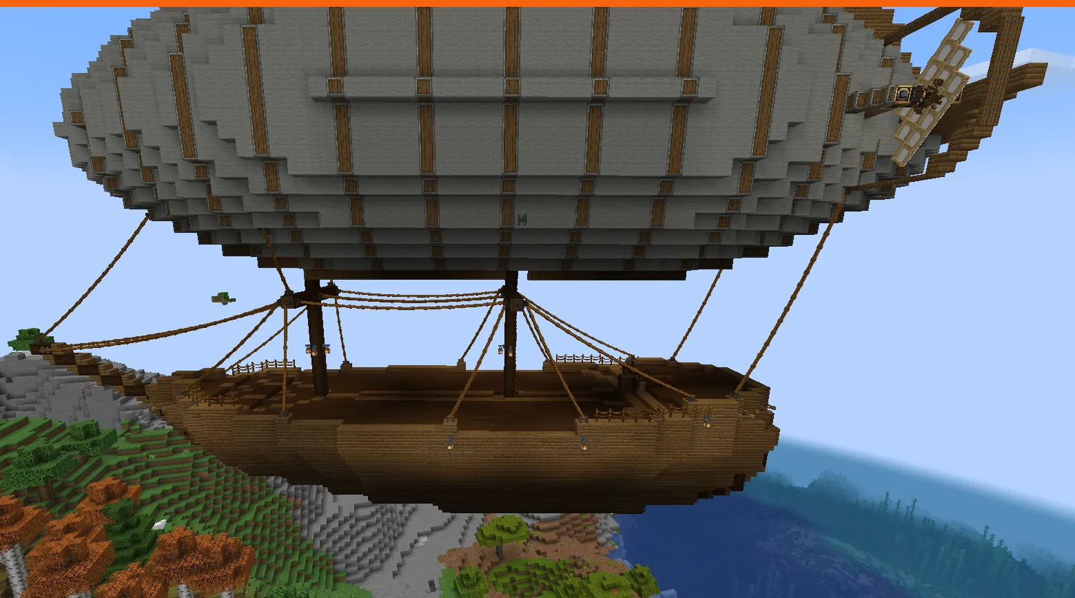 The PineWind Schematic Screenshots 3 Side profile of a massive wooden airship with a large grey balloon