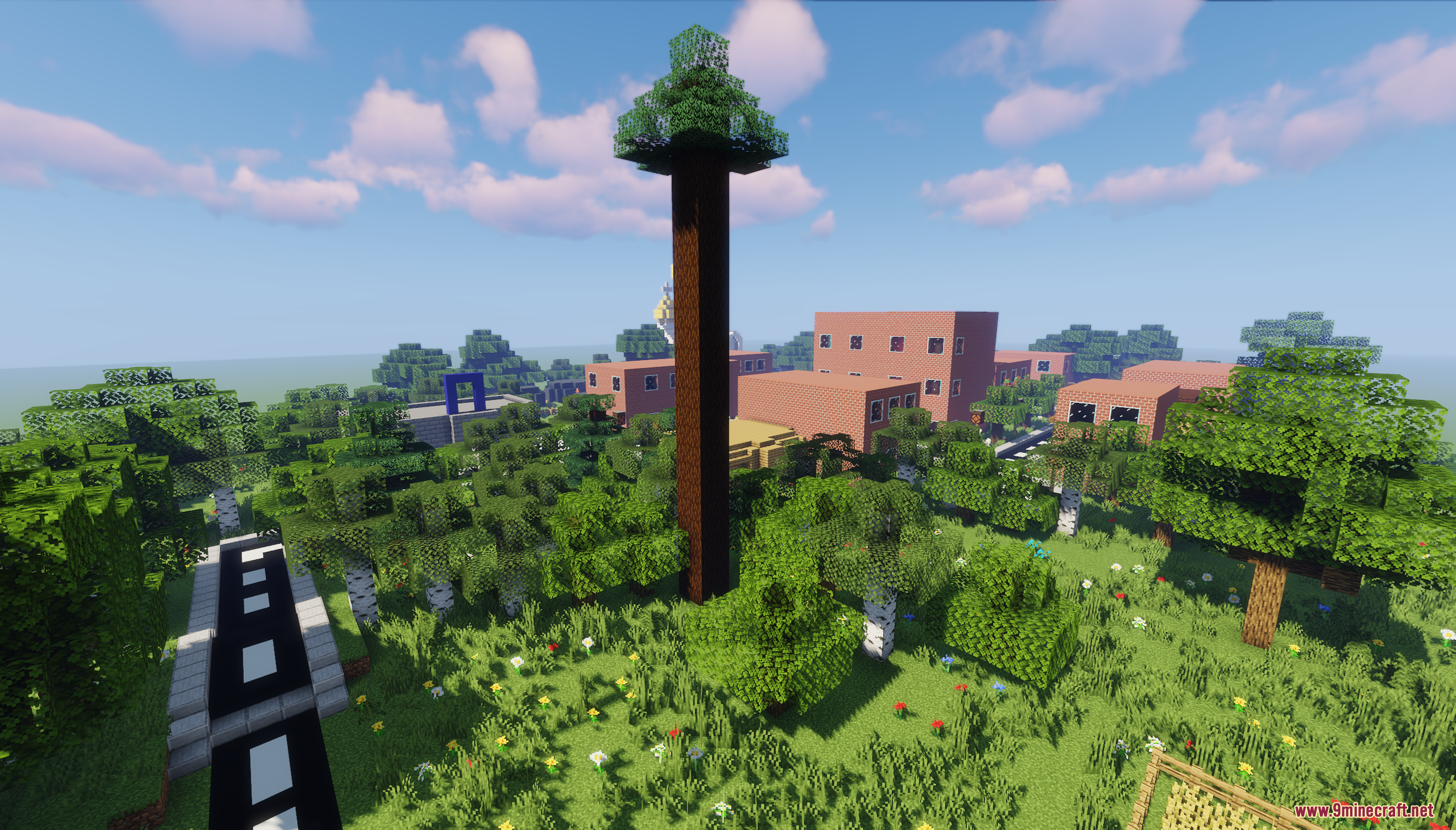 The Town of Mordovia Map Screenshot 2 A tall tree stands near brick buildings and a road in the forest