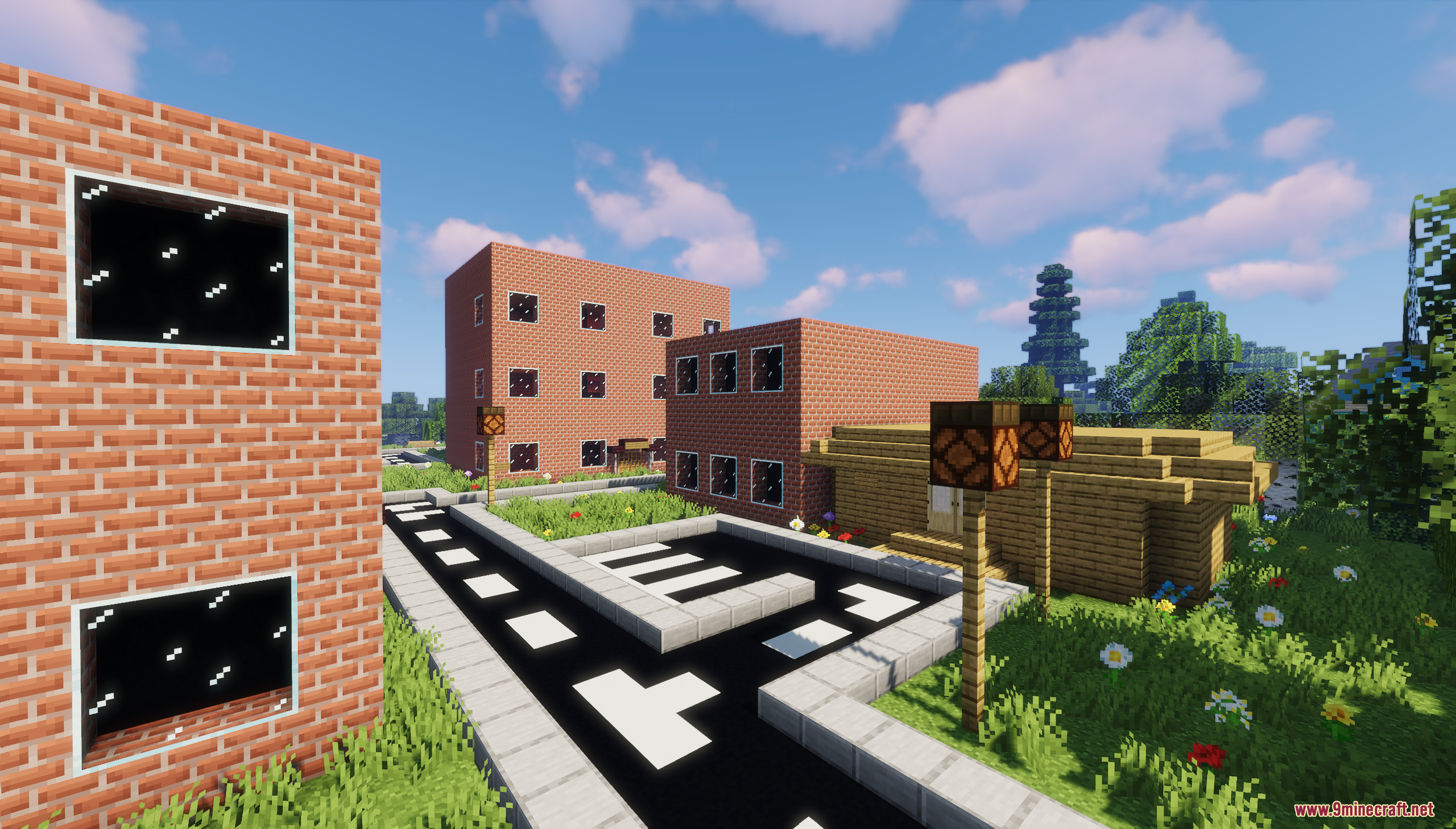 The Town of Mordovia Map Screenshot 4 Brick buildings and street lamps line an asphalt road in a peaceful town