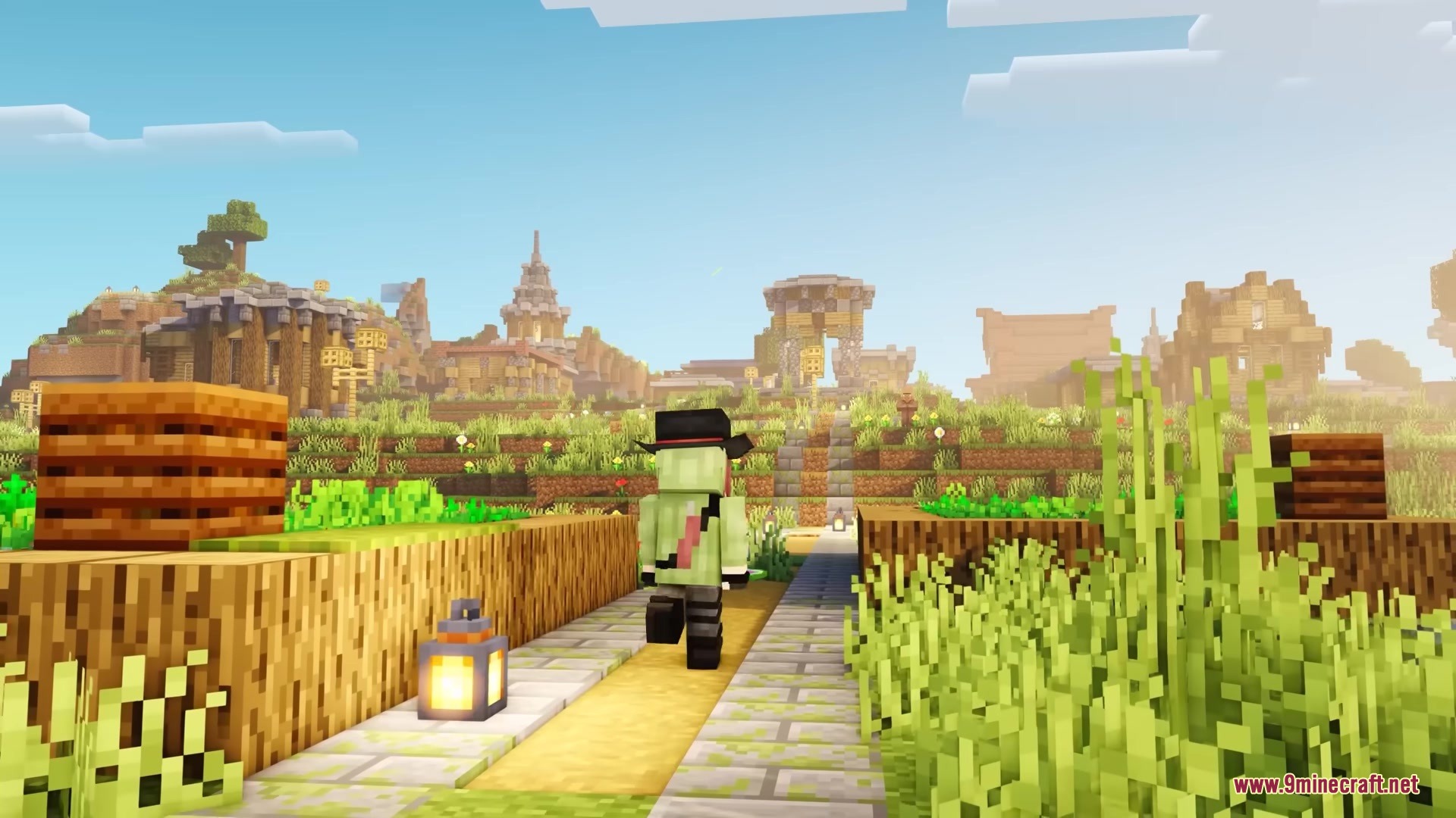 A player character walks along a stone path toward a scenic mountain village