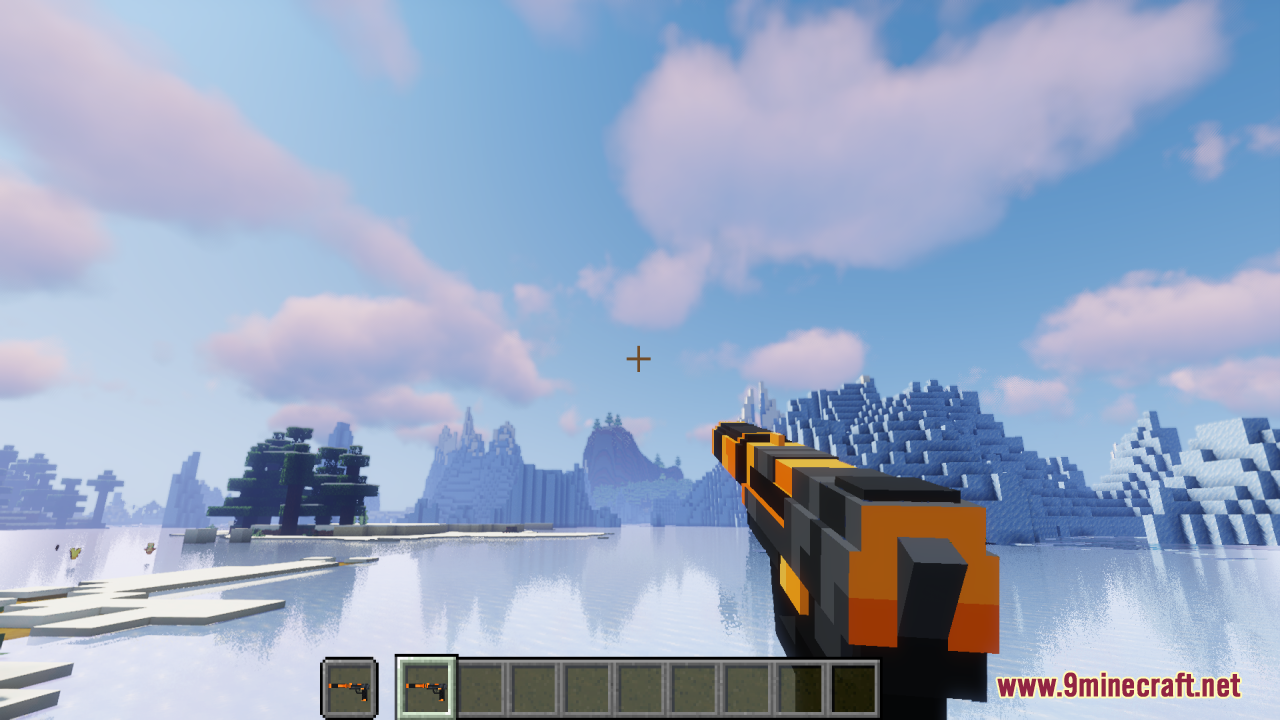 Player holding a single 3D pistol model in a frozen Minecraft landscape