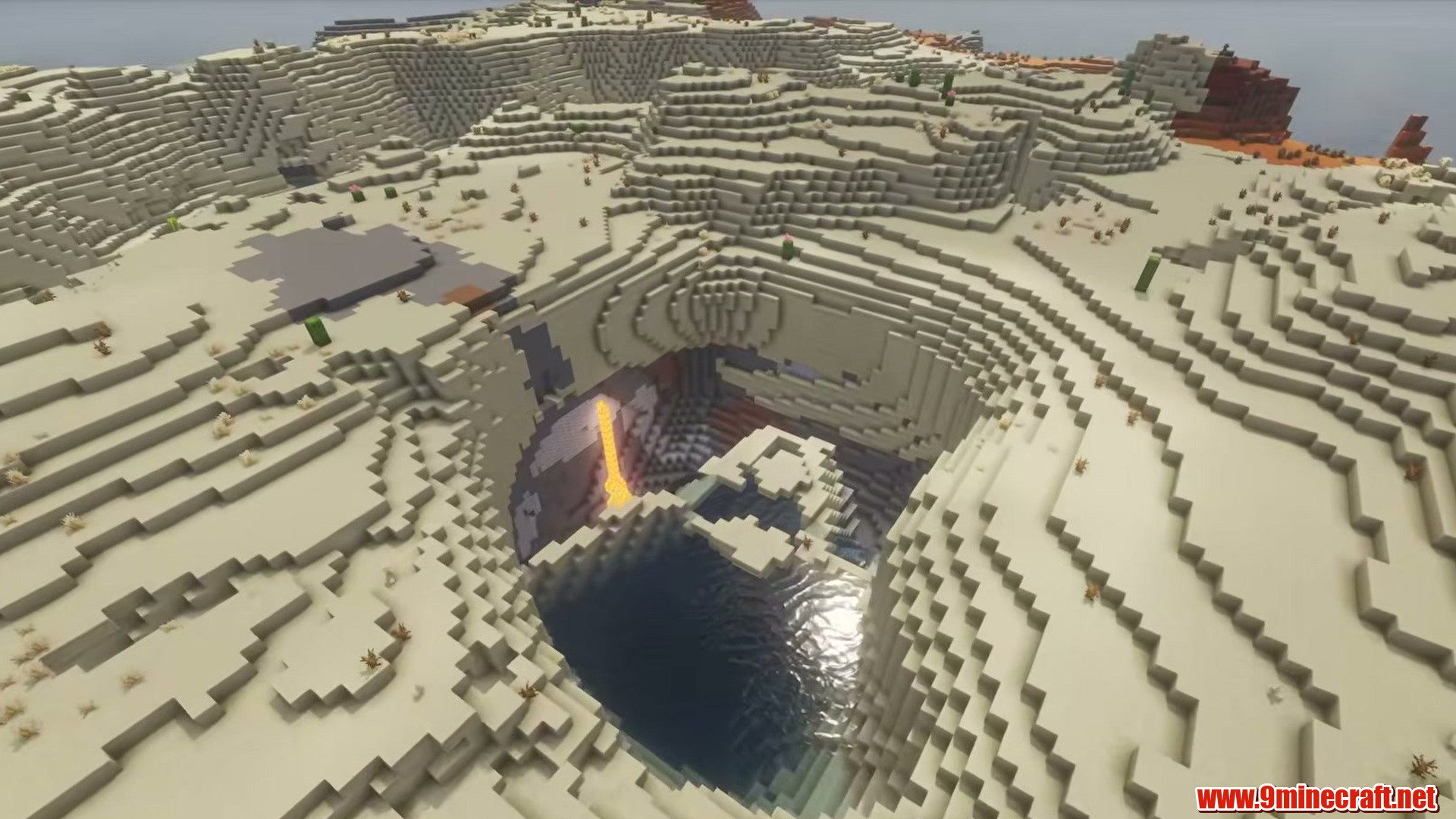 Sunken lava pit below the flat desert