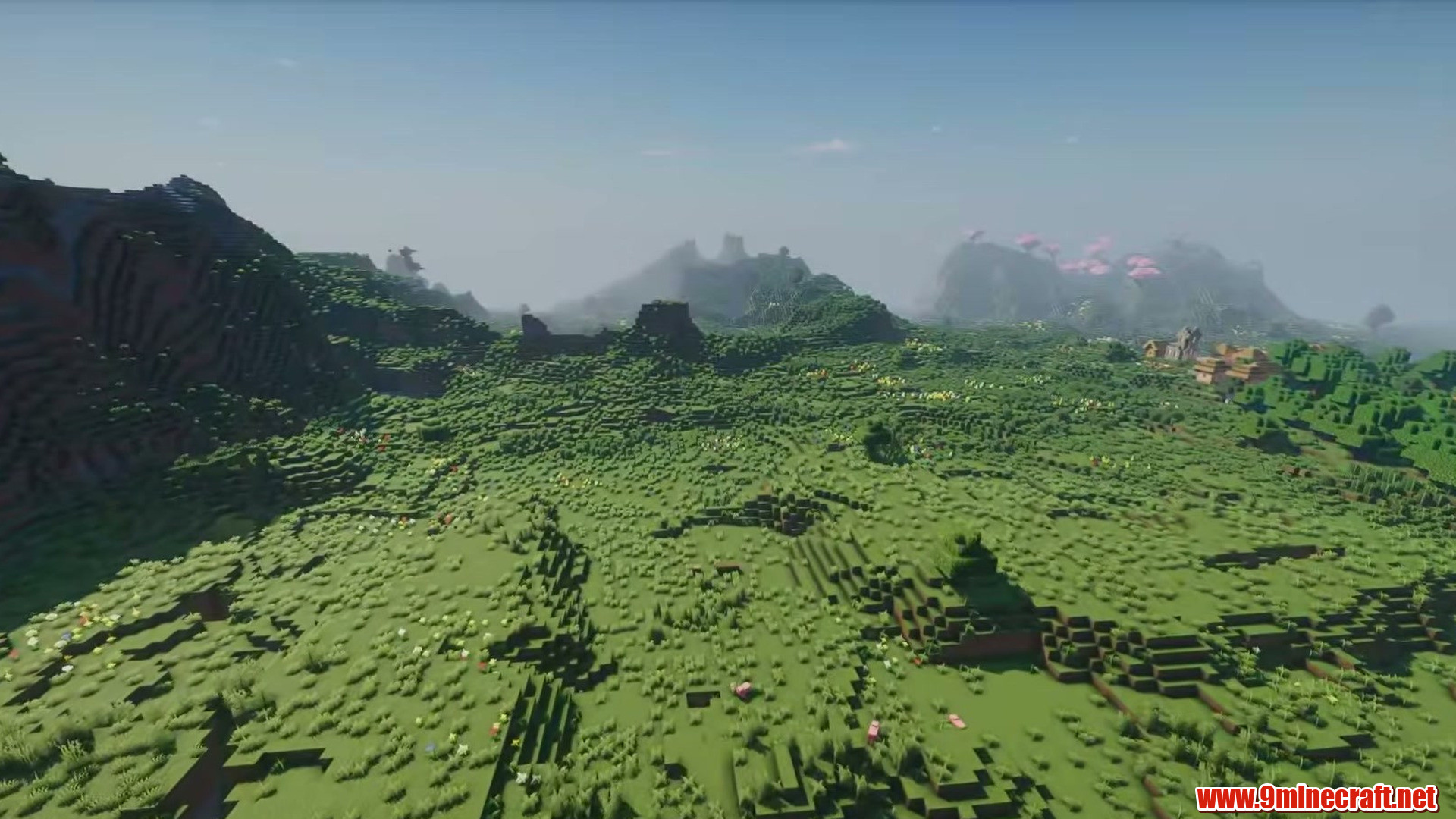 Snowy peak above green meadows in Minecraft seed 4884759591111811394