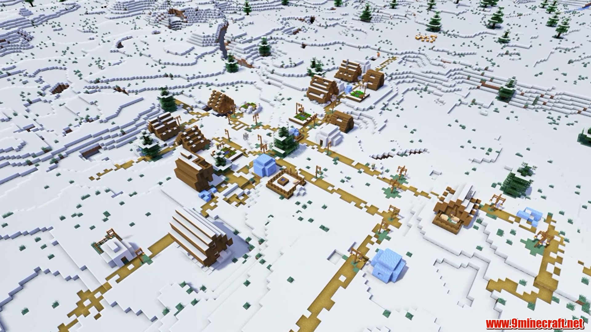 Snow-covered village houses and paths