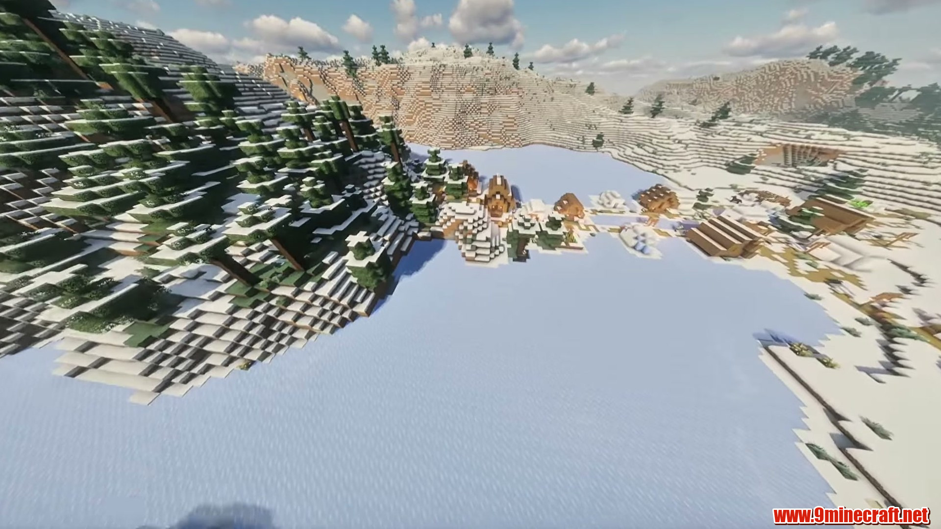 Frozen lake surrounded by a mountain village