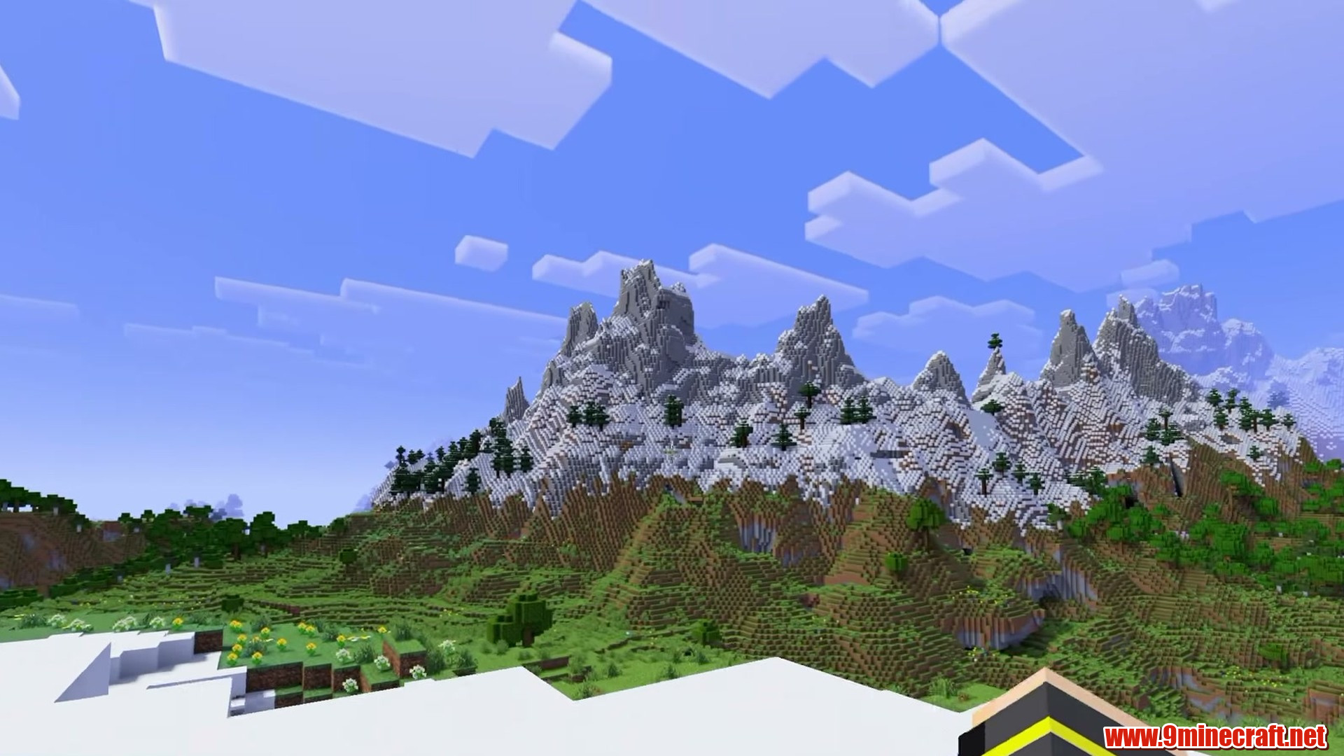 Snowy mountain range around the starter valley in Minecraft seed 164094852