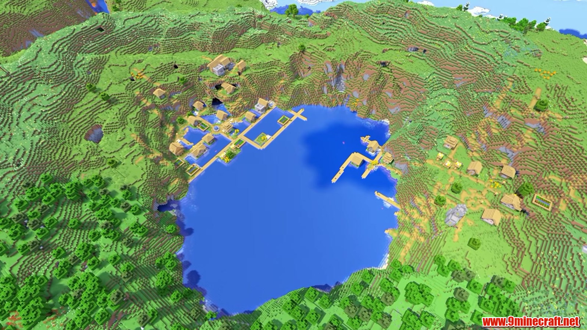 Village buildings reflected in the lake water