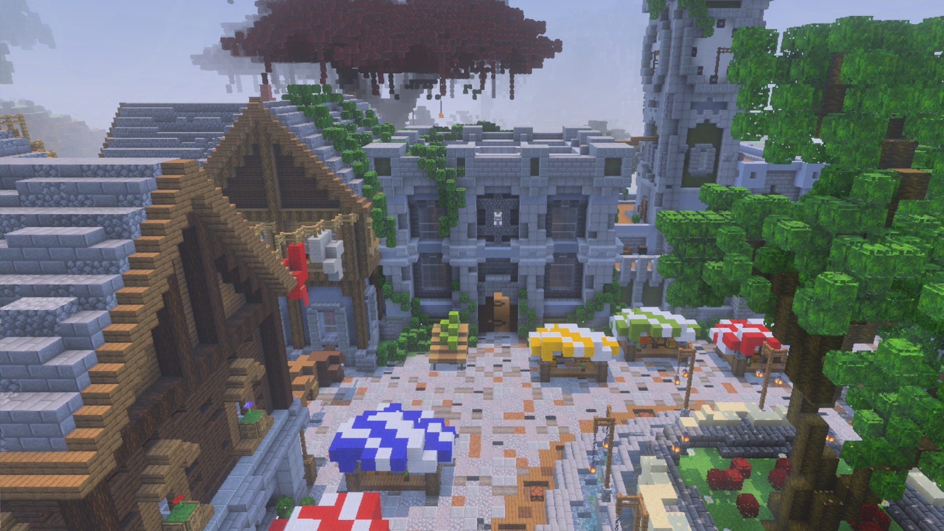 Medieval town square featuring market stalls and a bright red tree