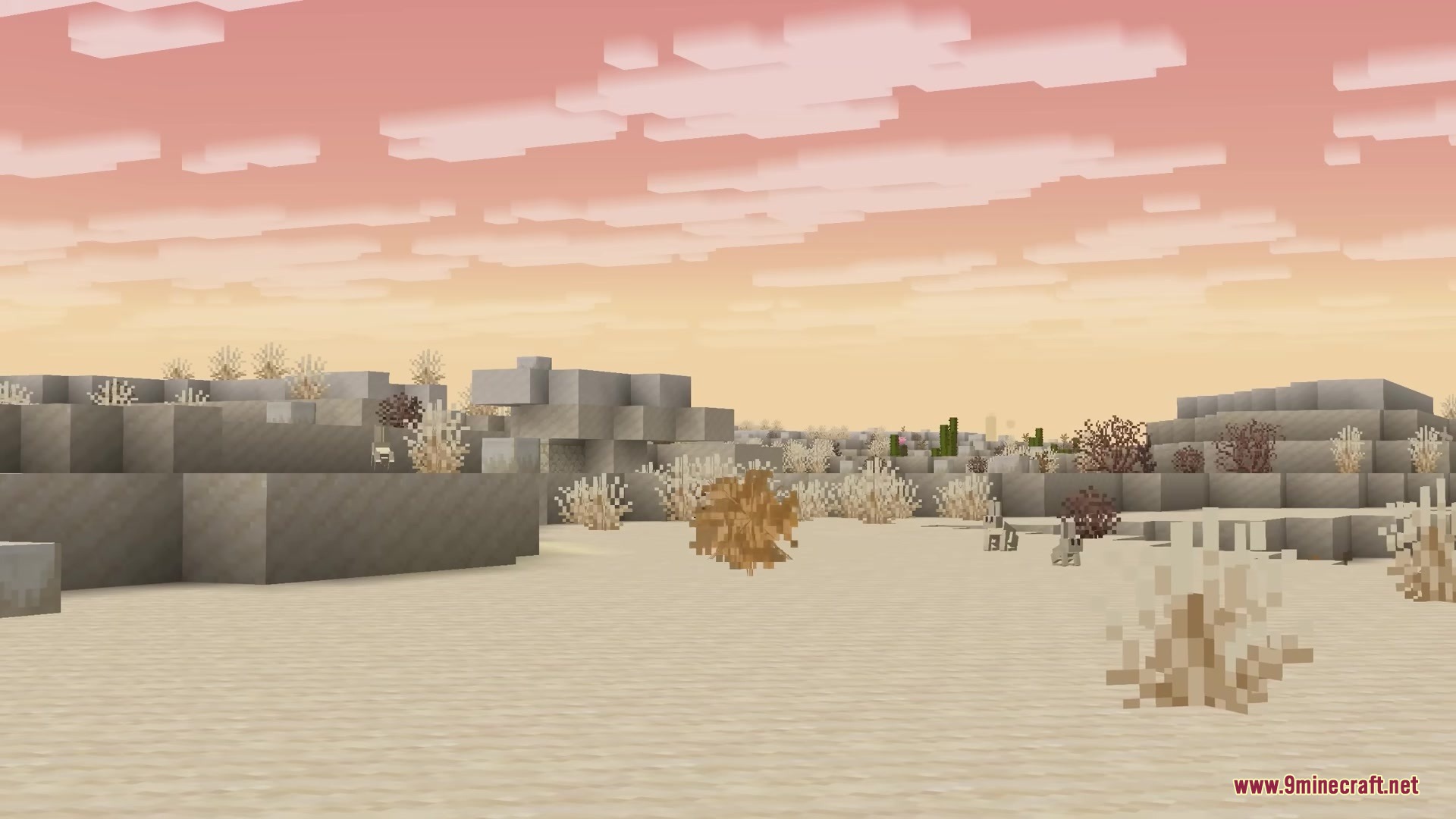 Tumbleweeds Mod Screenshot 5 A tumbleweed rolls across the sand in a desert biome at sunset