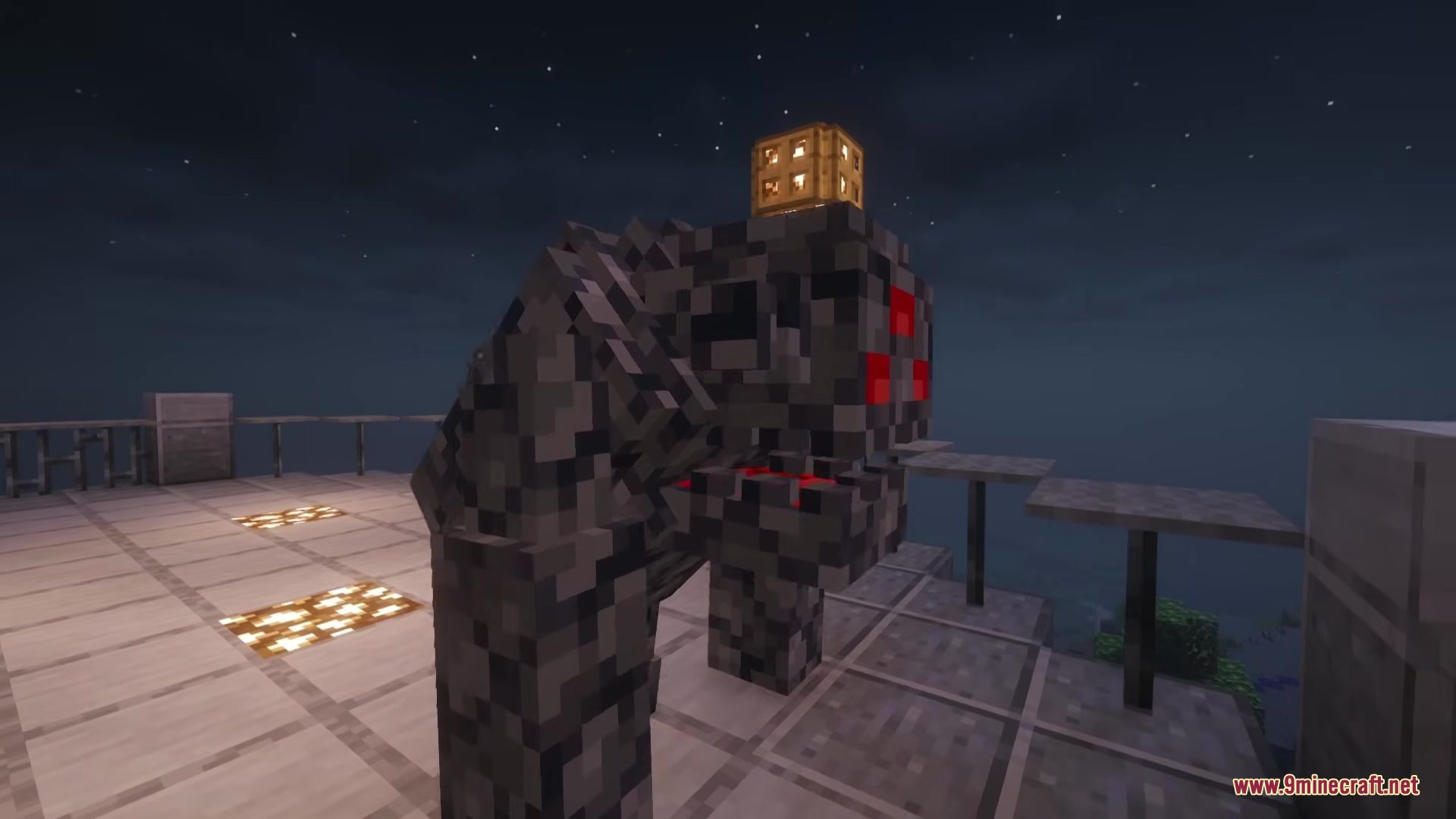 Twisted Mobs Mod Screenshot 5 A large Gritlock monster with glowing red eyes stands on a platform