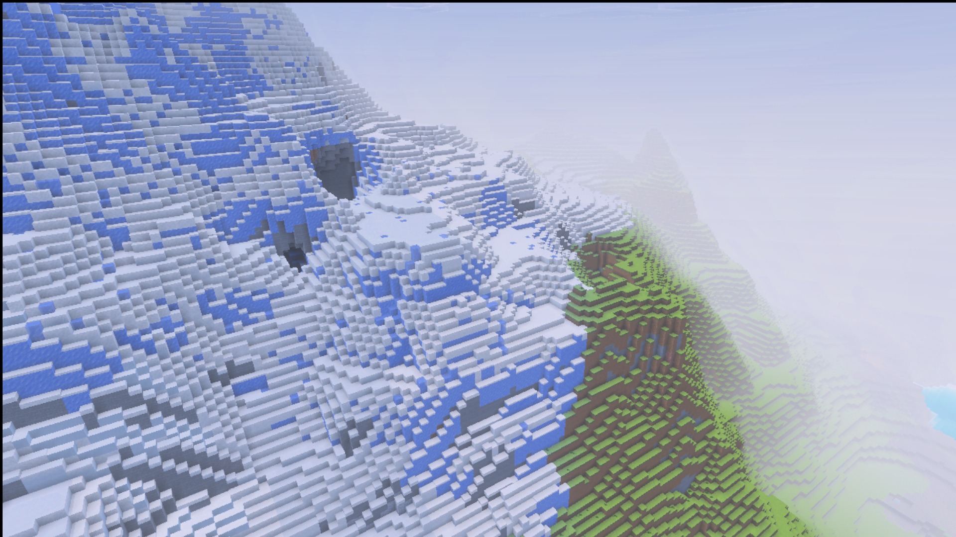 A snowy mountain slope and stone terrain using the Ultimate Survival textures