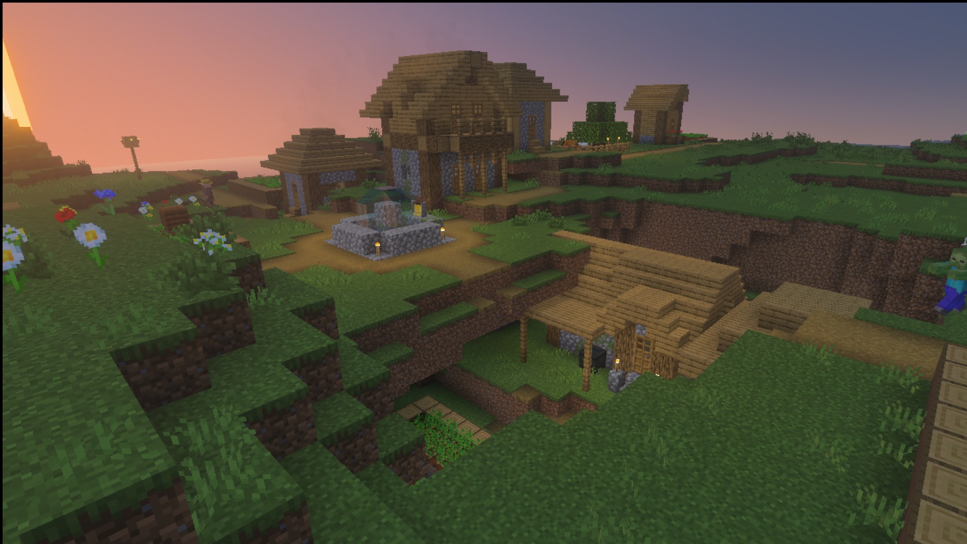 Wooden houses and a village fountain at sunset with the Ultimate Survival pack