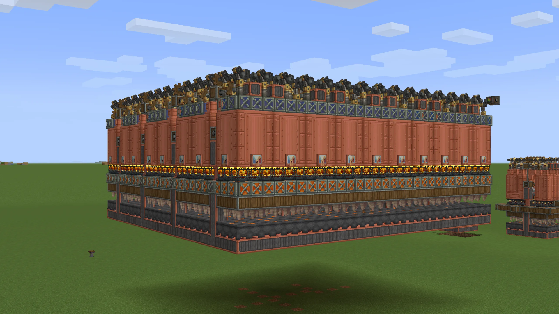 A massive array of tiled steam engines floating above a flat green field