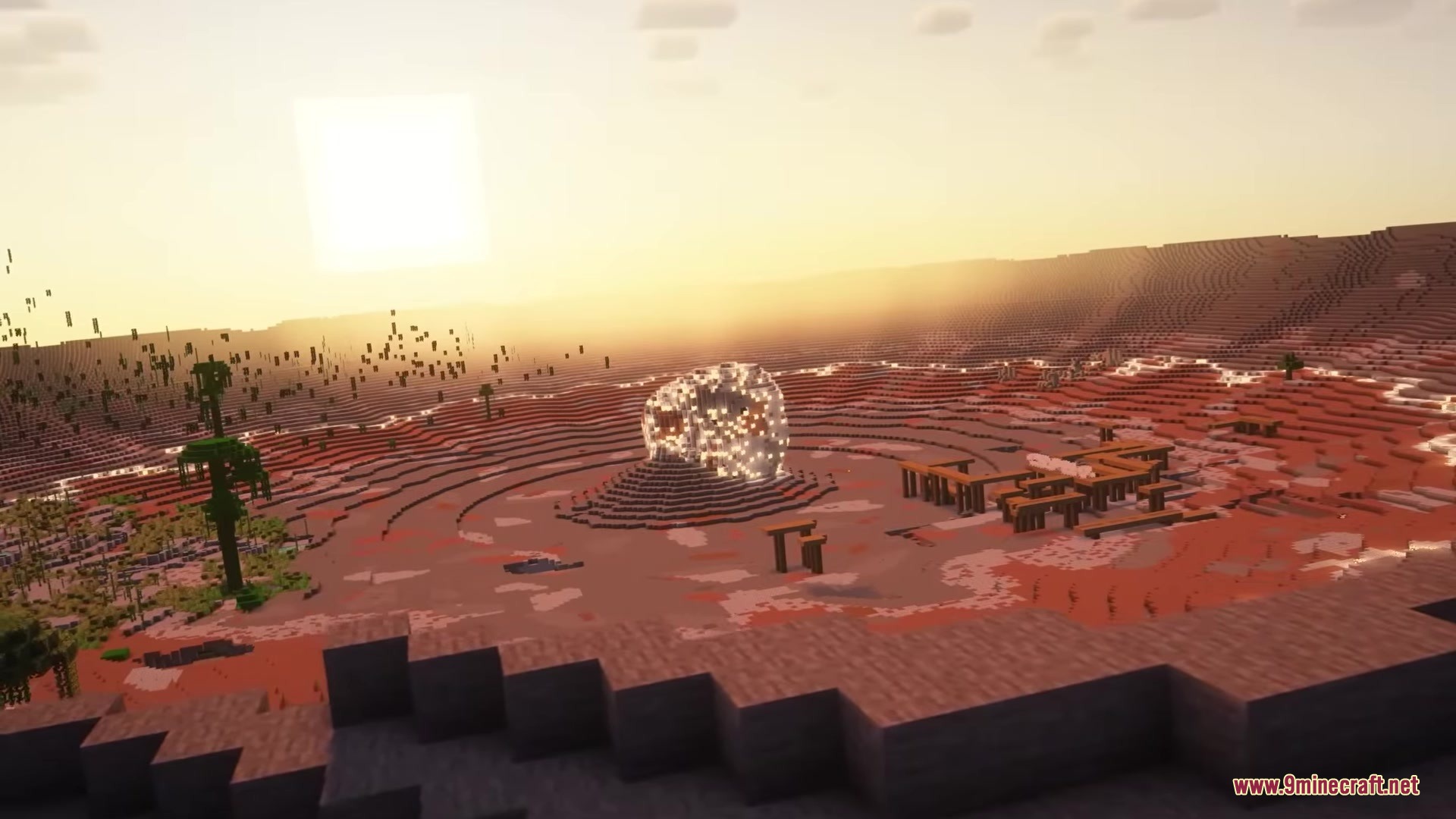UnderMod Mod Screenshot 10 A massive meteor crater in the desert featuring a glowing central structure