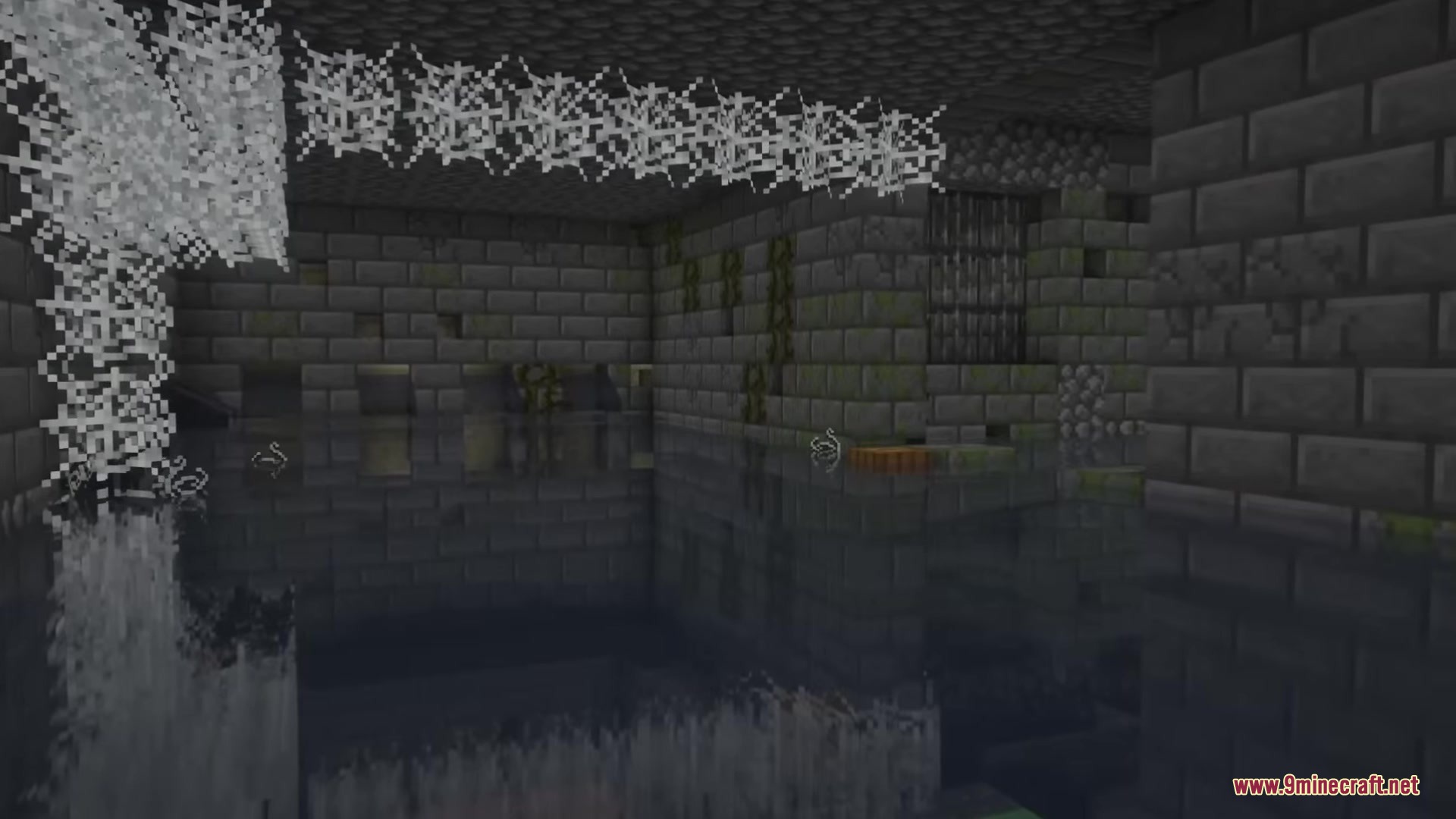 UnderMod Mod Screenshot 2 Ancient sewers under a village featuring stone brick walls and thick cobwebs
