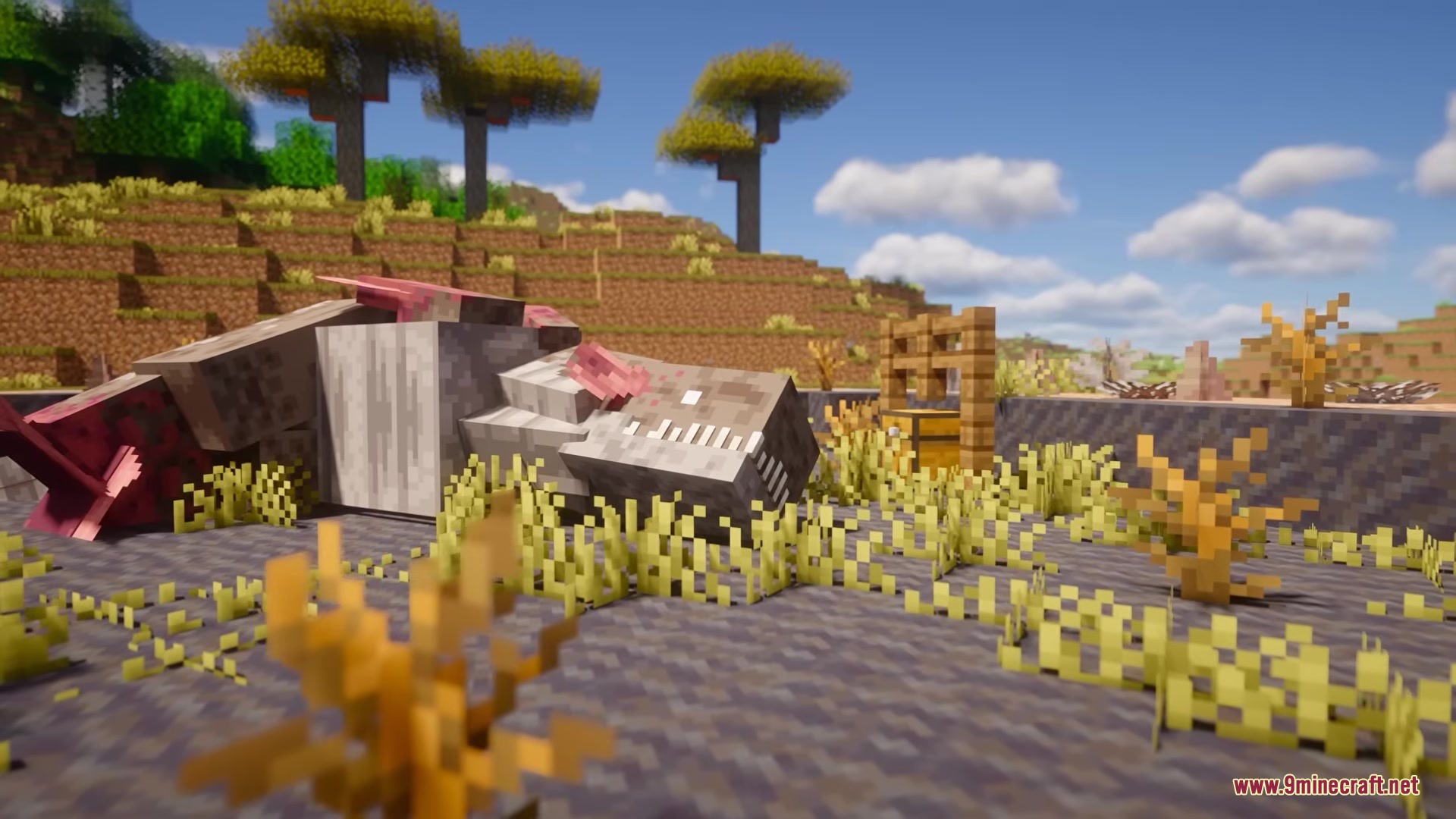 Defeated monster carcass lying on the ground in a dry savanna biome
