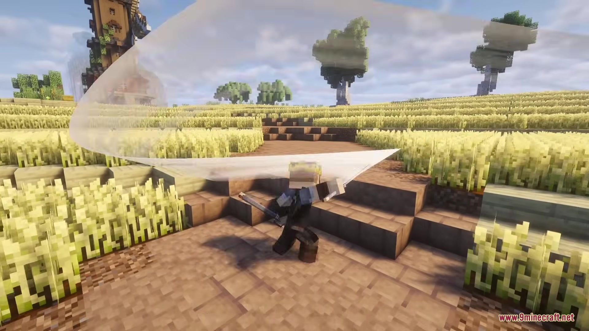 A Minecraft player performs a powerful sword slash in a golden wheat field