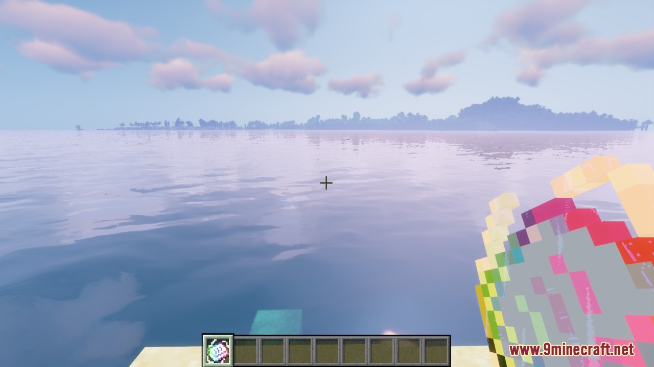 Player holding a colorful enchanted book while looking at the vast ocean