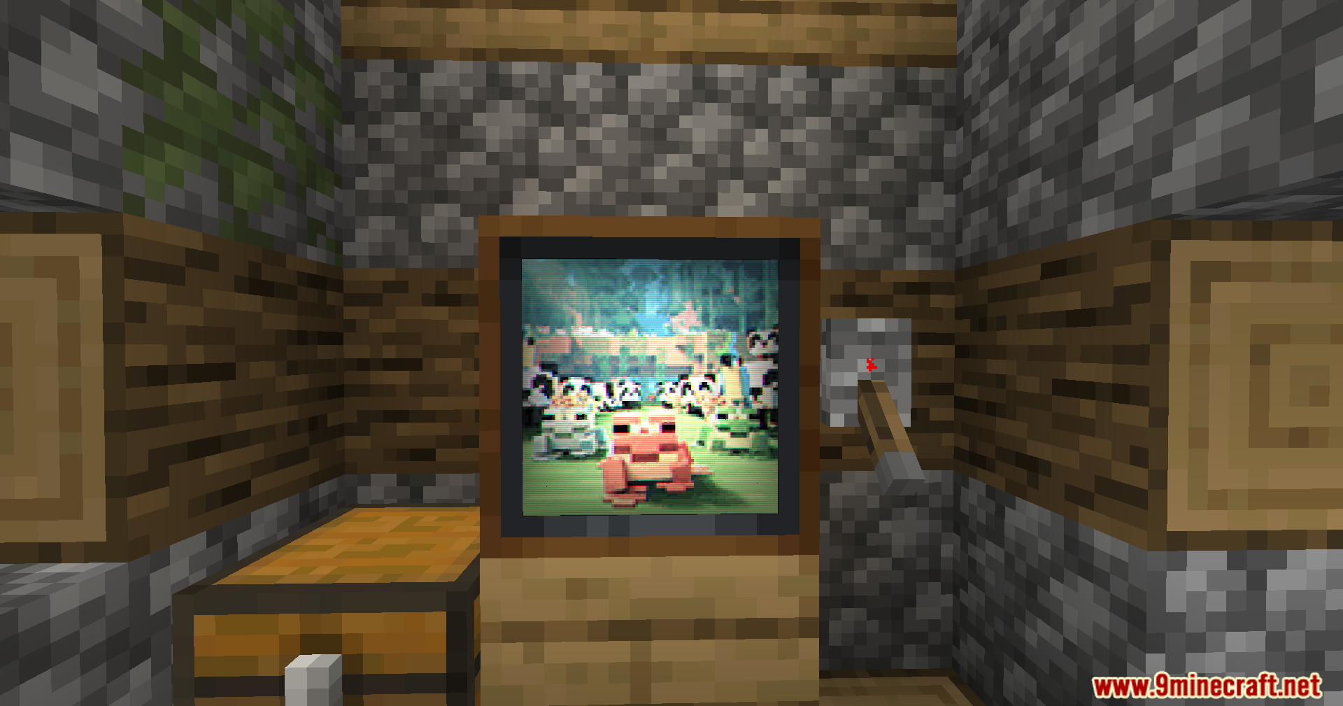 Vista Mod Screenshot 11 A television block playing a colorful animation of frogs in a jungle