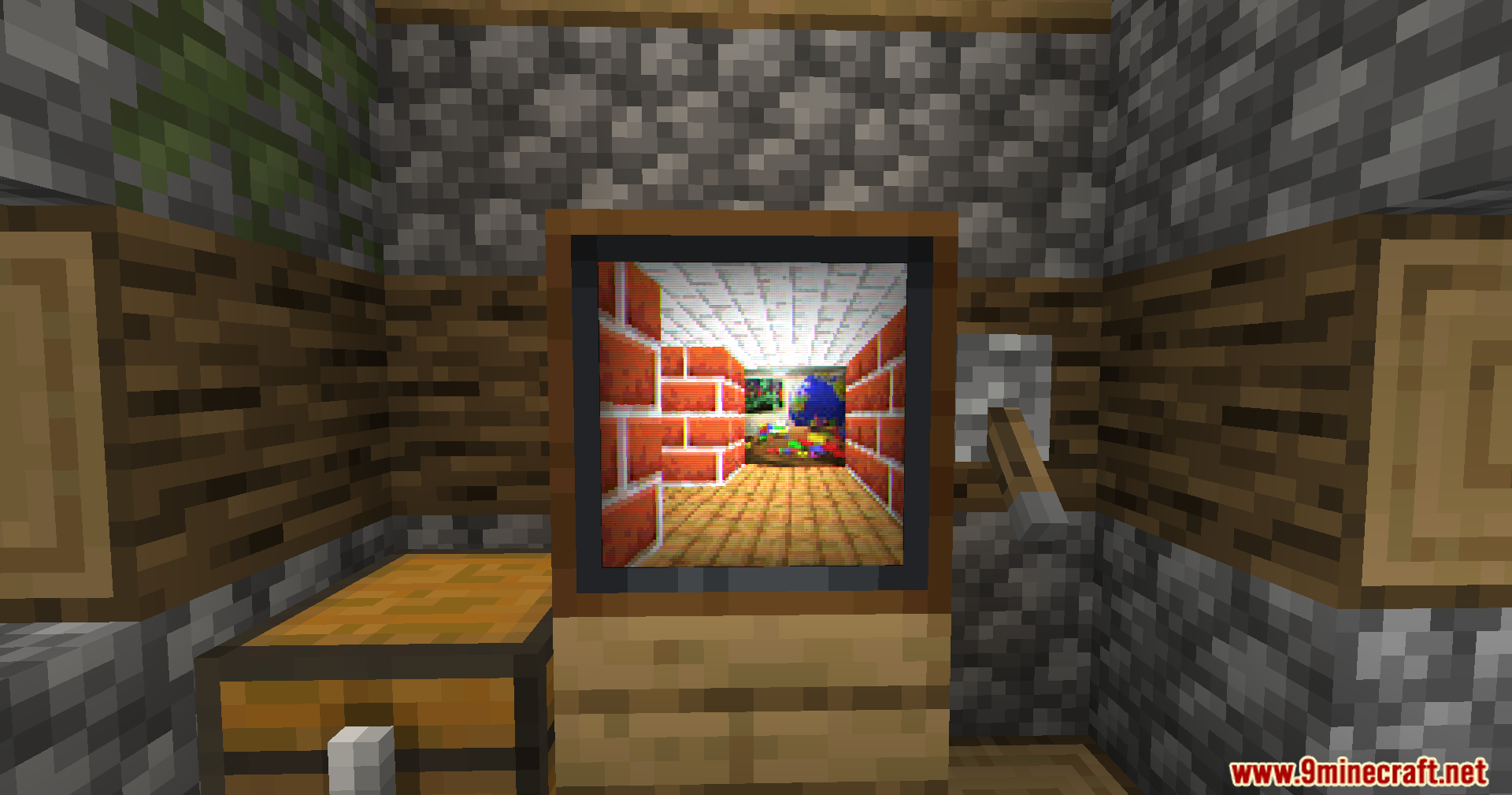 Vista Mod Screenshot 13 A Minecraft television block displaying a colorful retro brick maze animation