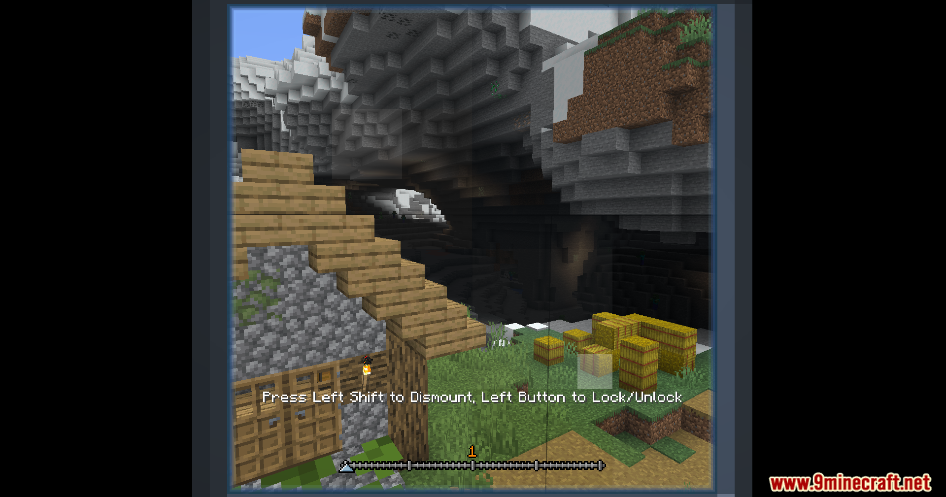 Vista Mod Screenshot 3 A camera view showing a wooden house and hay bales near a cave