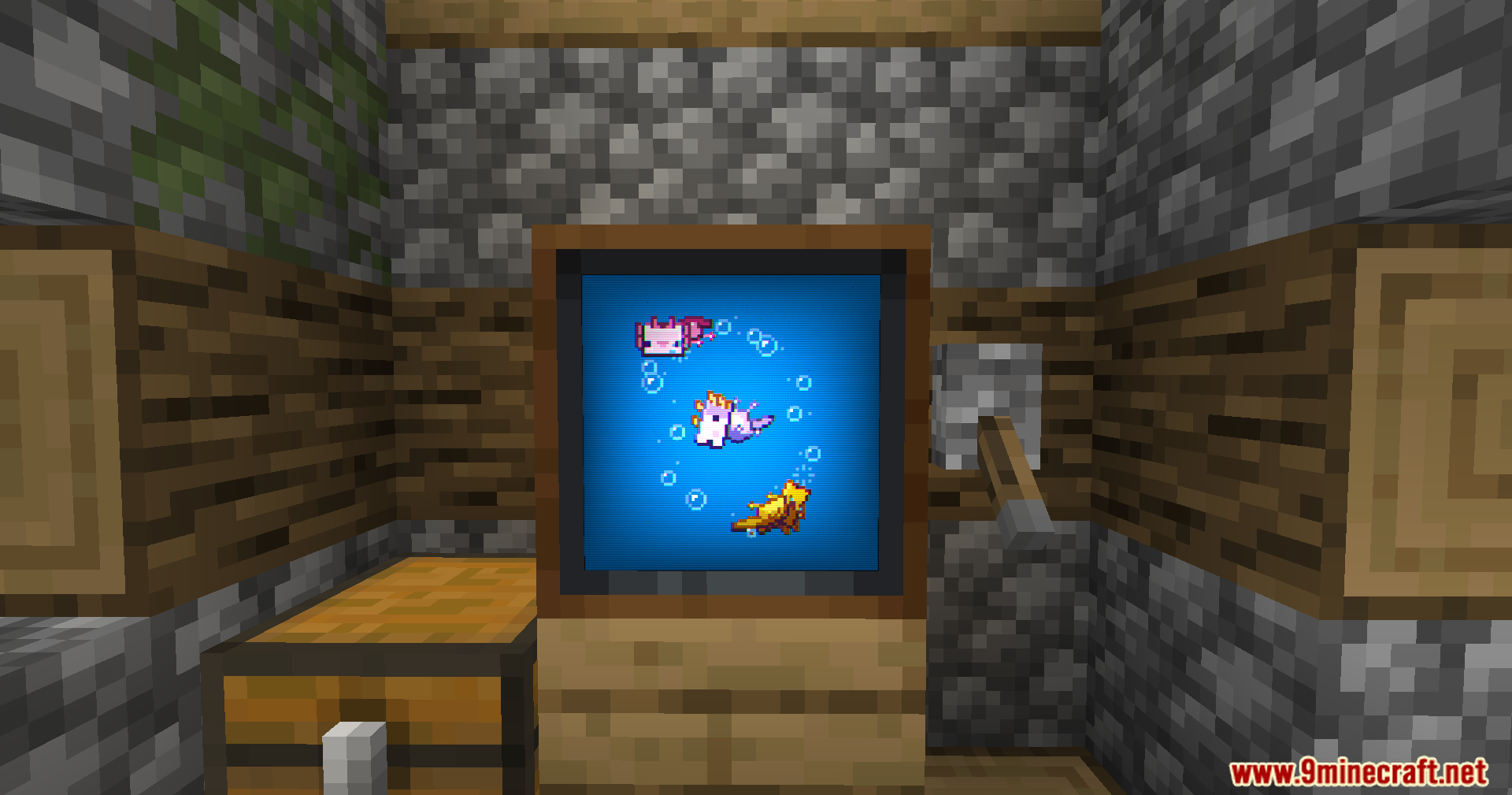 Vista Mod Screenshot 8 A television screen displaying an animation of three axolotls swimming in circles