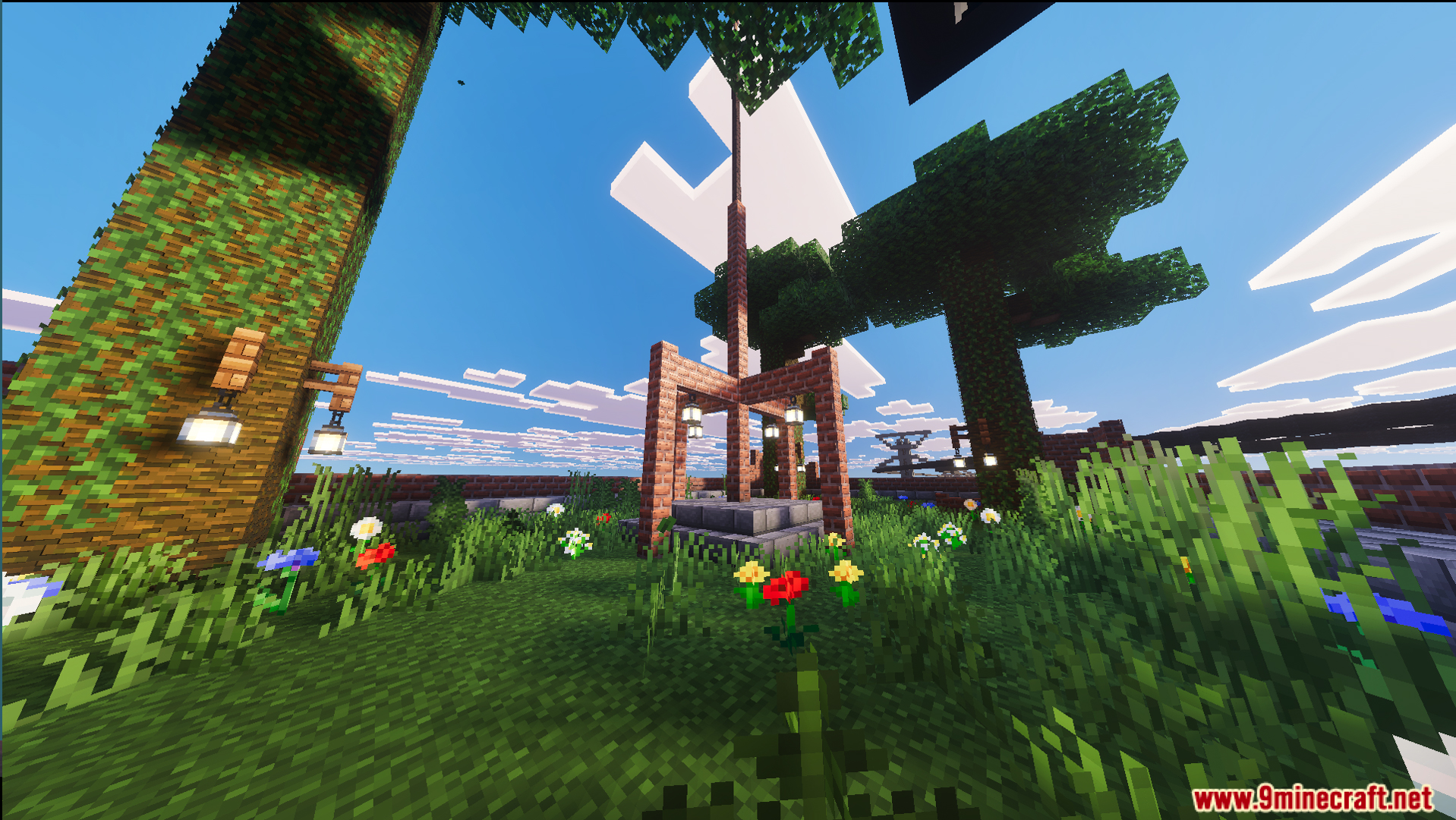 Beautiful high aerial garden featuring lanterns and colorful flowers under green trees